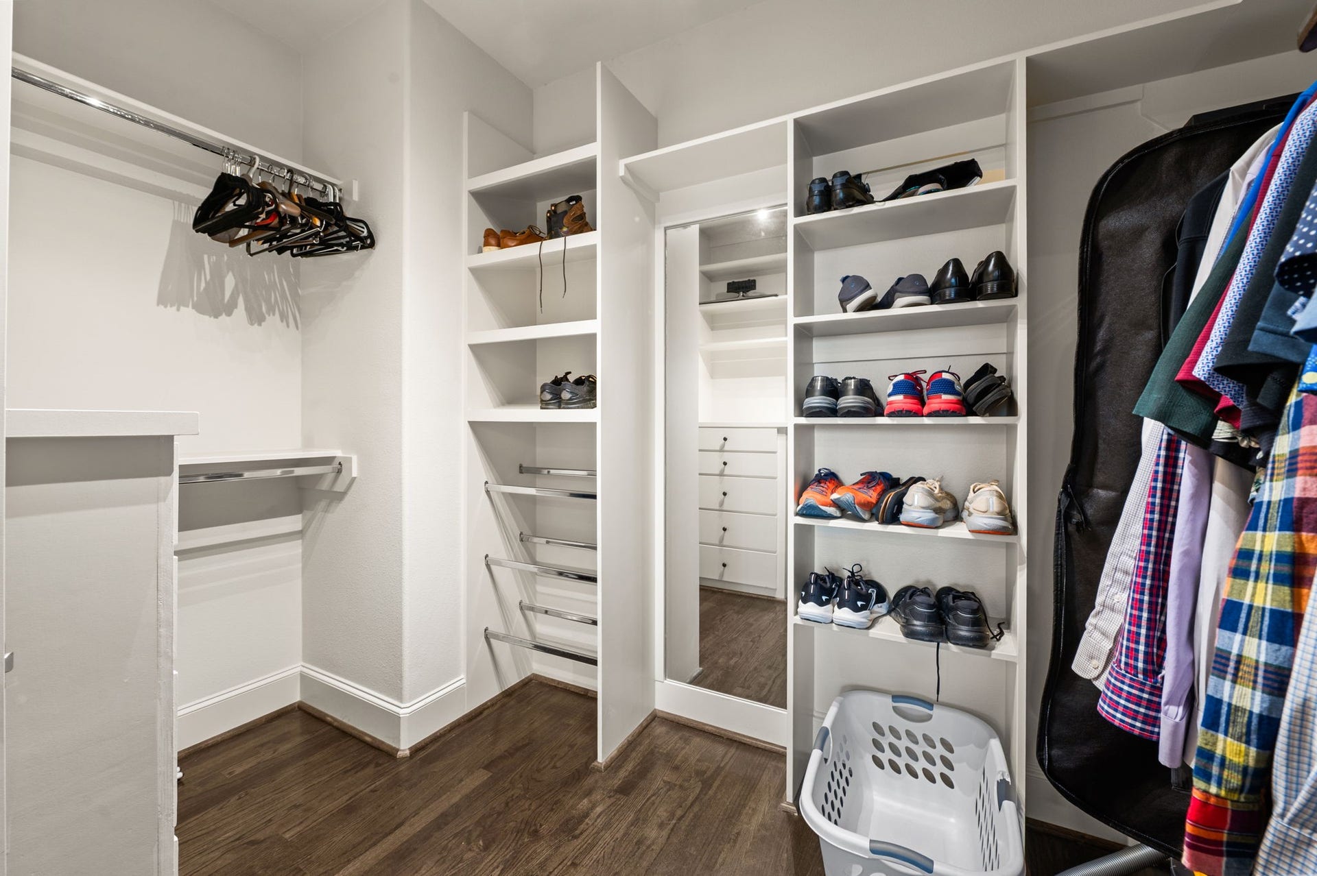 The Primary closet is huge! The built-in shelving maximizes the vertical space and improves functionality and organization