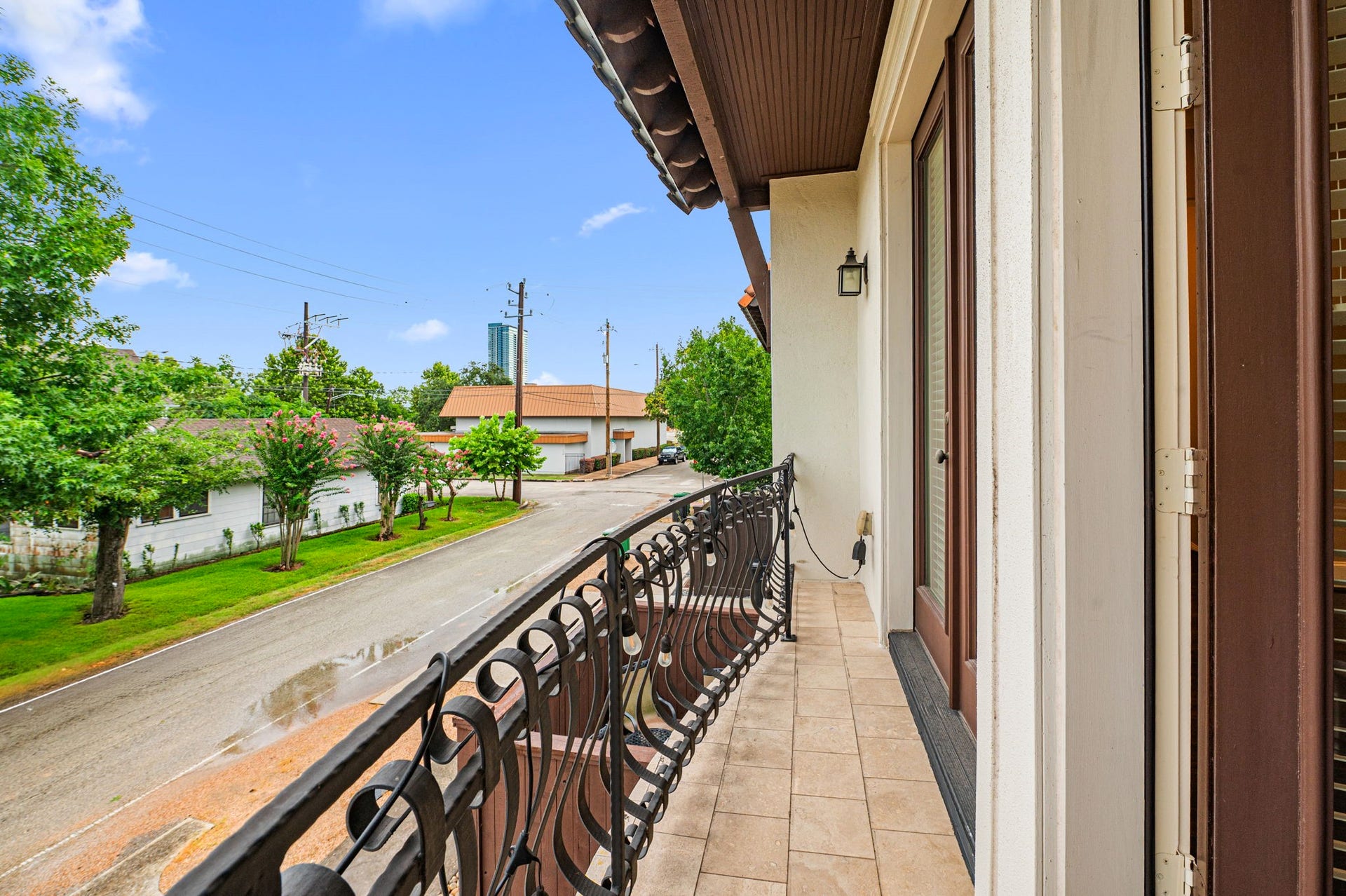 The step off balcony located on the 2nd floor is accessible from double french doors where all 4 doors can open.