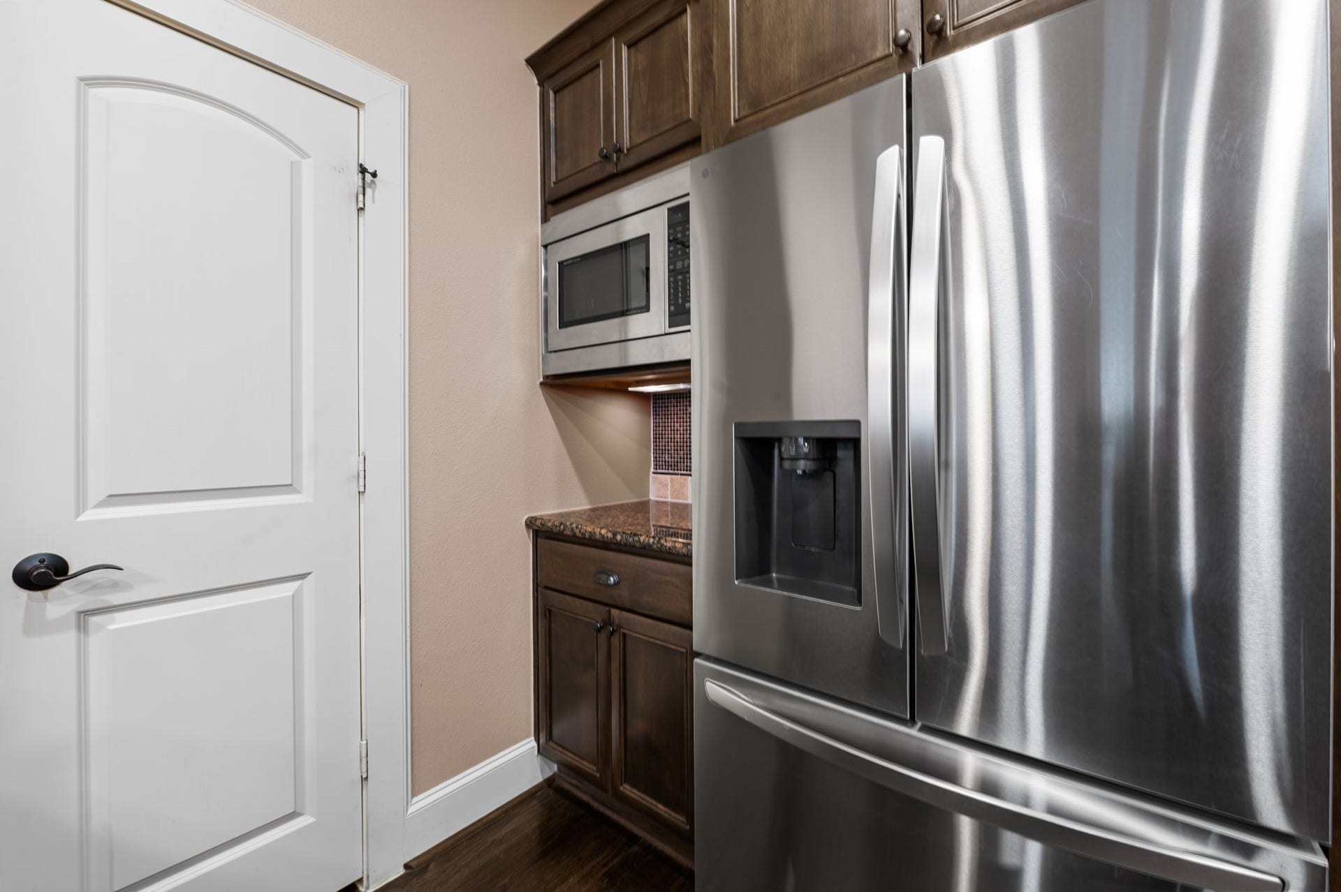 This home has a spacious pantry and a designated coffee bar area.