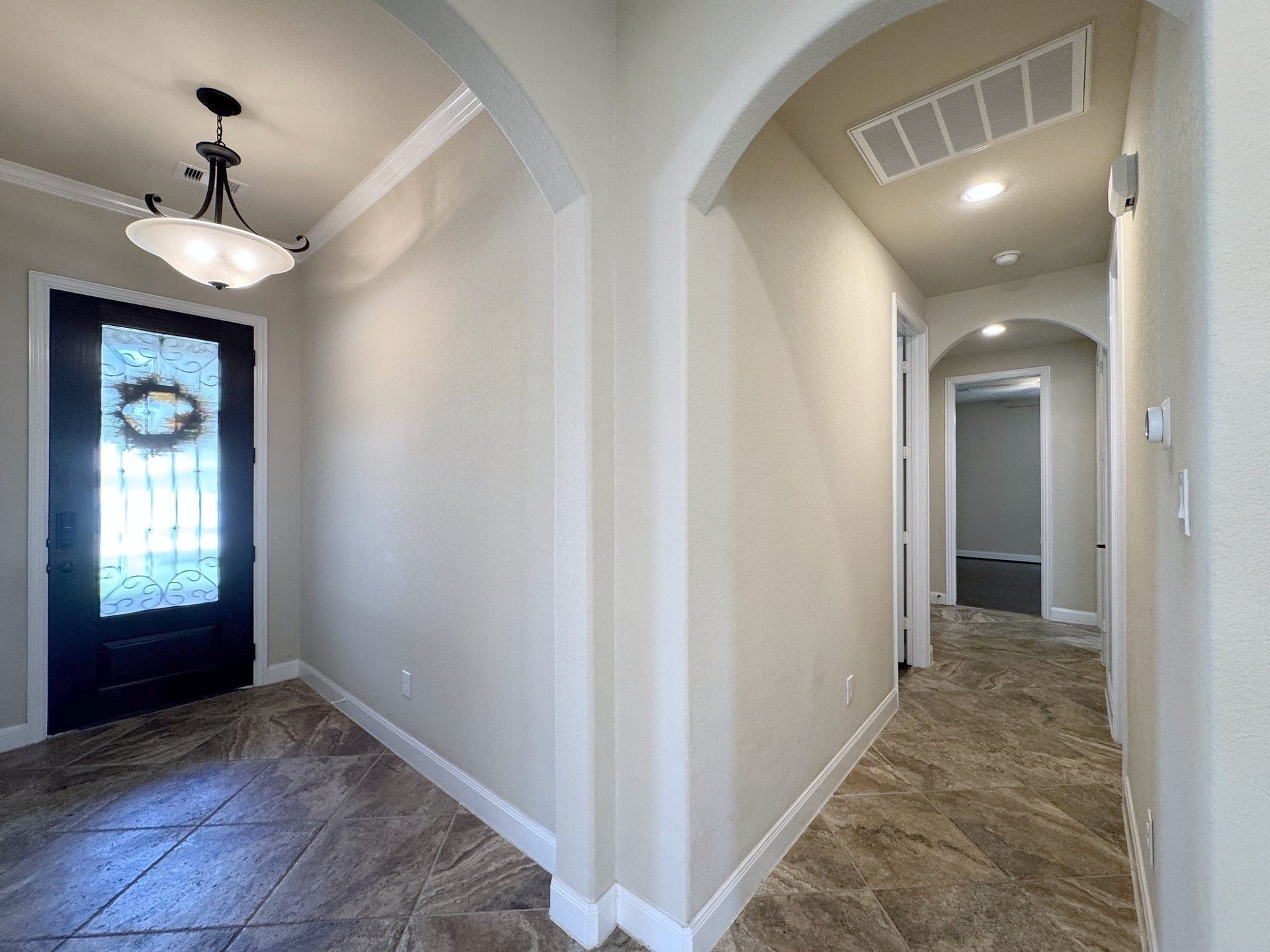 Hallway to secondary bedrooms.