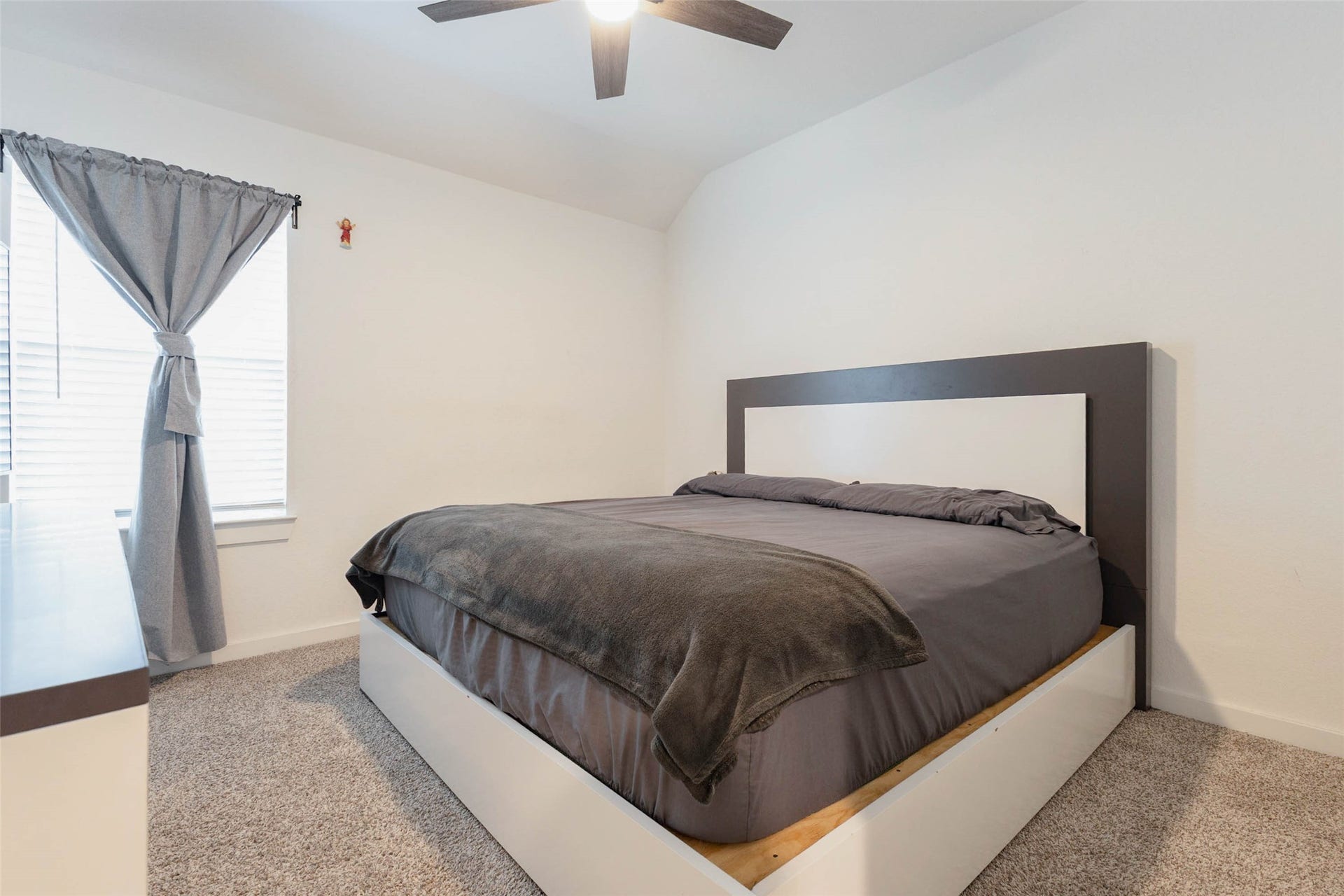 3205 Bello Green Lane, Katy, TX 77493 Bedroom with gray bedding