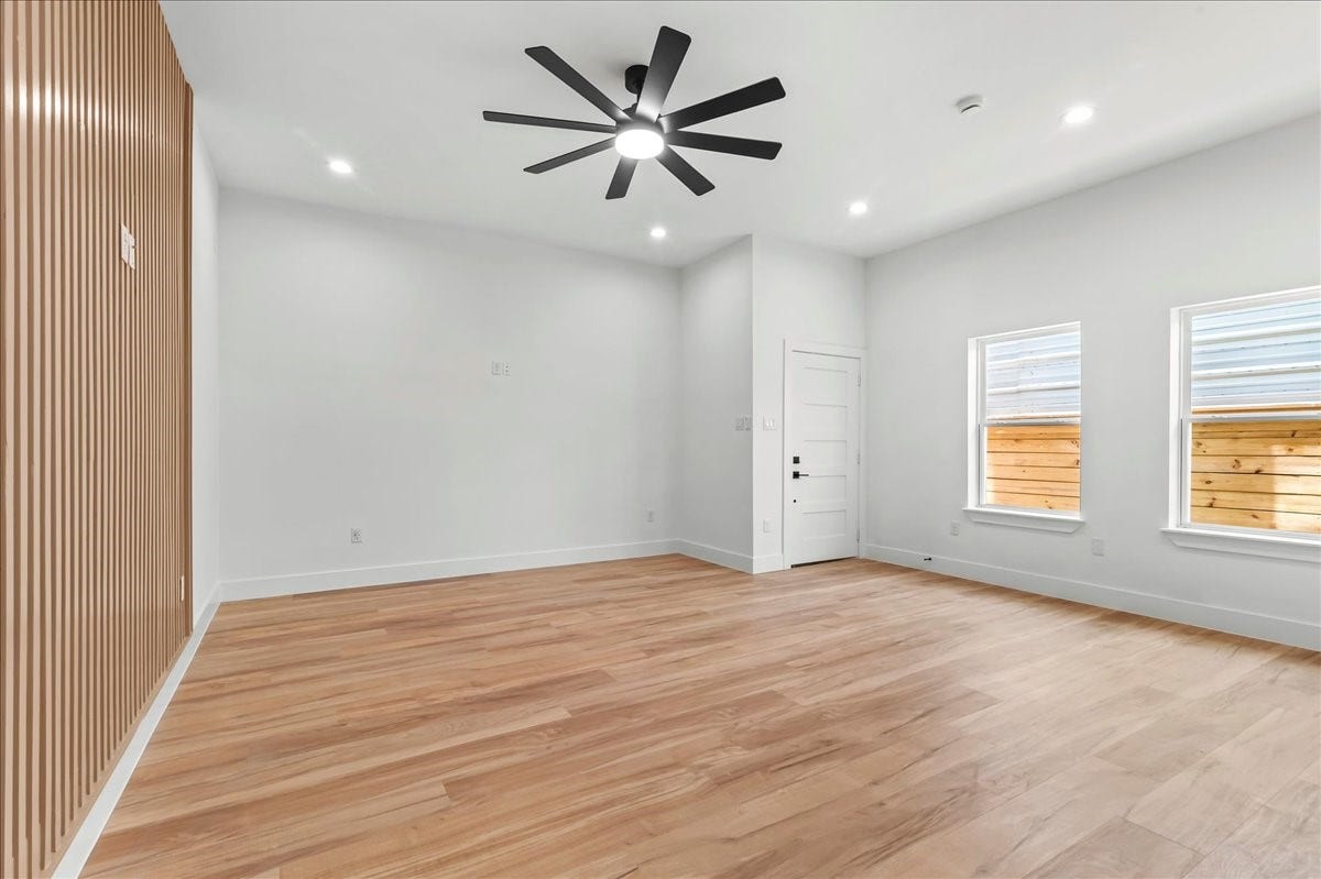 8323 Observatory Street, #A/B, Houston, TX 77088 Unit B - Spacious living area. Accent Wall design may vary. Pictures are from a previous build.