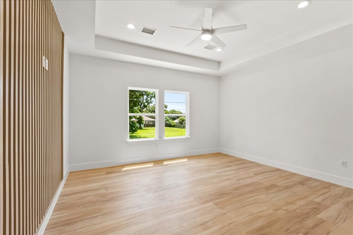 8323 Observatory Street, #A/B, Houston, TX 77088 Unit A - Luxurious primary suite. Accent Wall design may vary. Pictures are from a previous build.