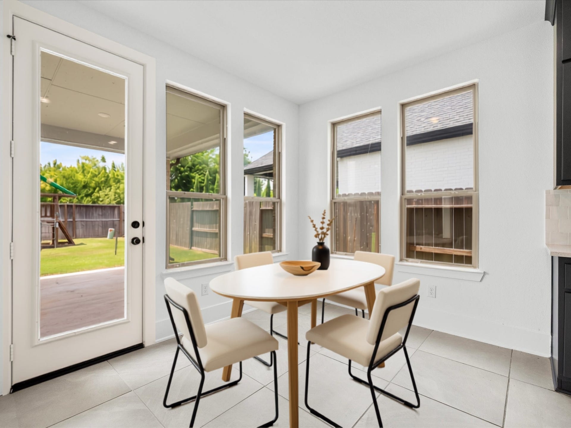 1911 Golden Leaf Drive, Missouri City, TX 77459 Bright breakfast area with lots of windows leading outside and abundant natural light. *virtually staged*