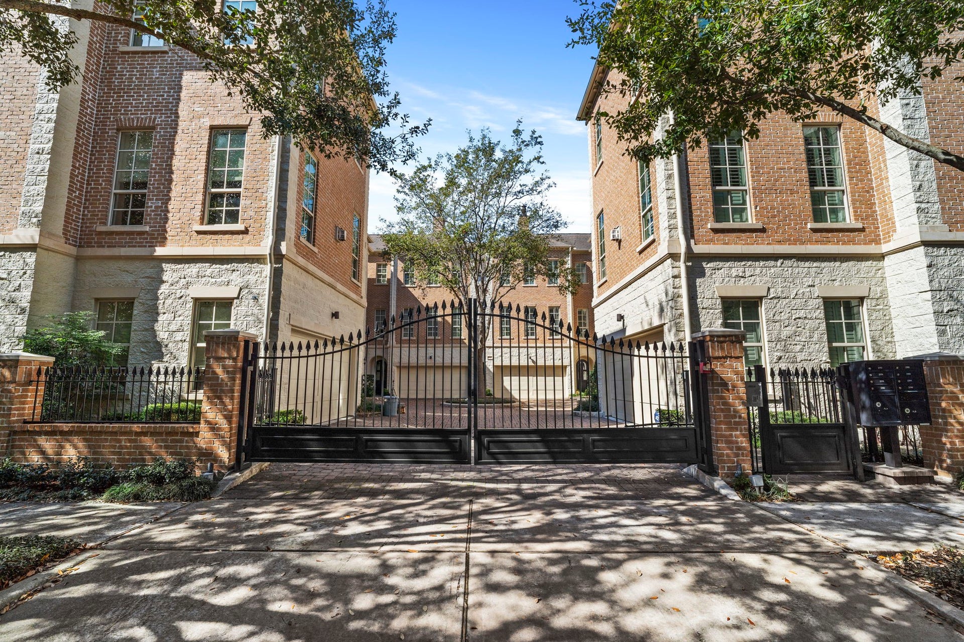 Welcoming front entry and gated access.