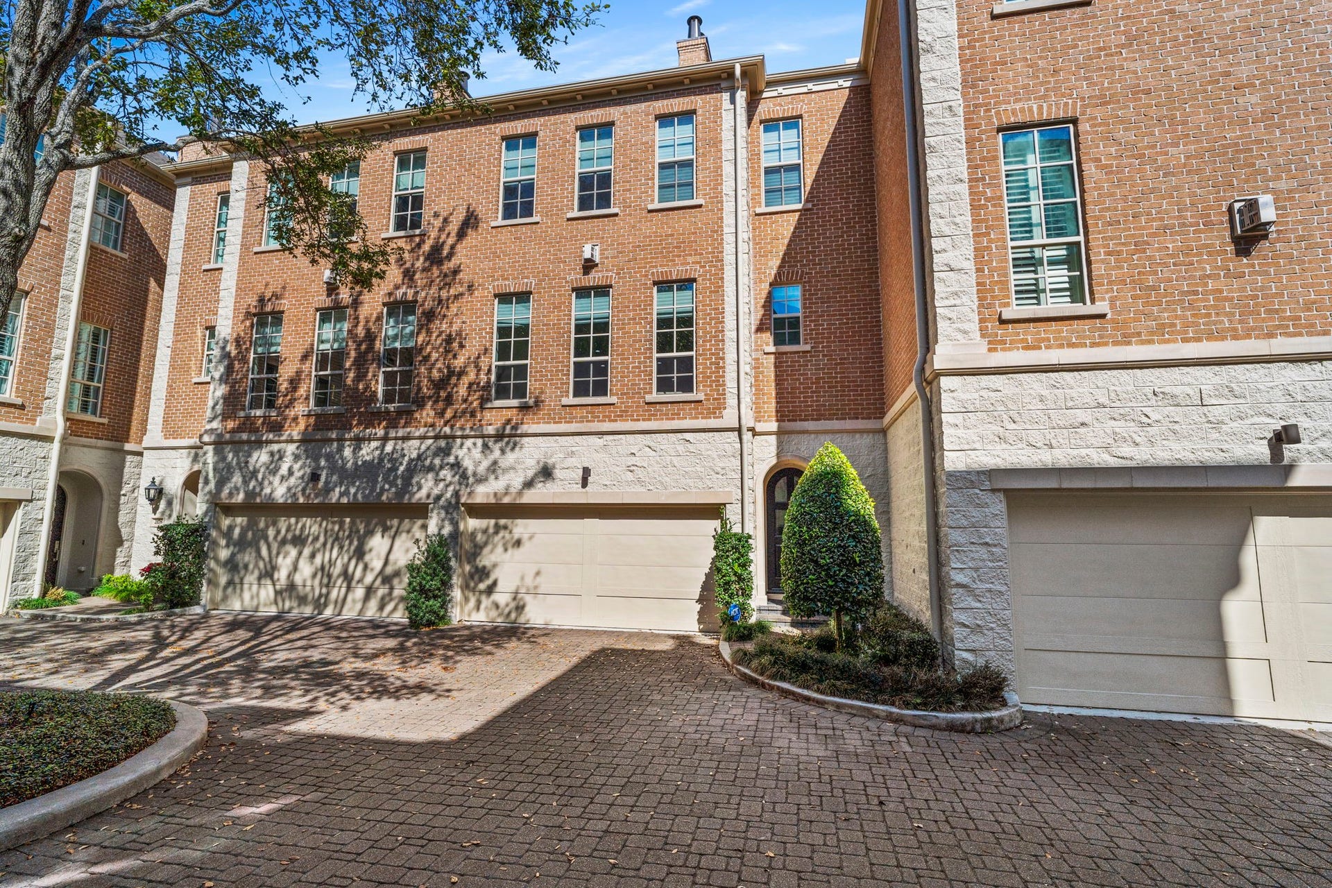 Welcome home to this beautiful townhome with private driveway and attached garage!