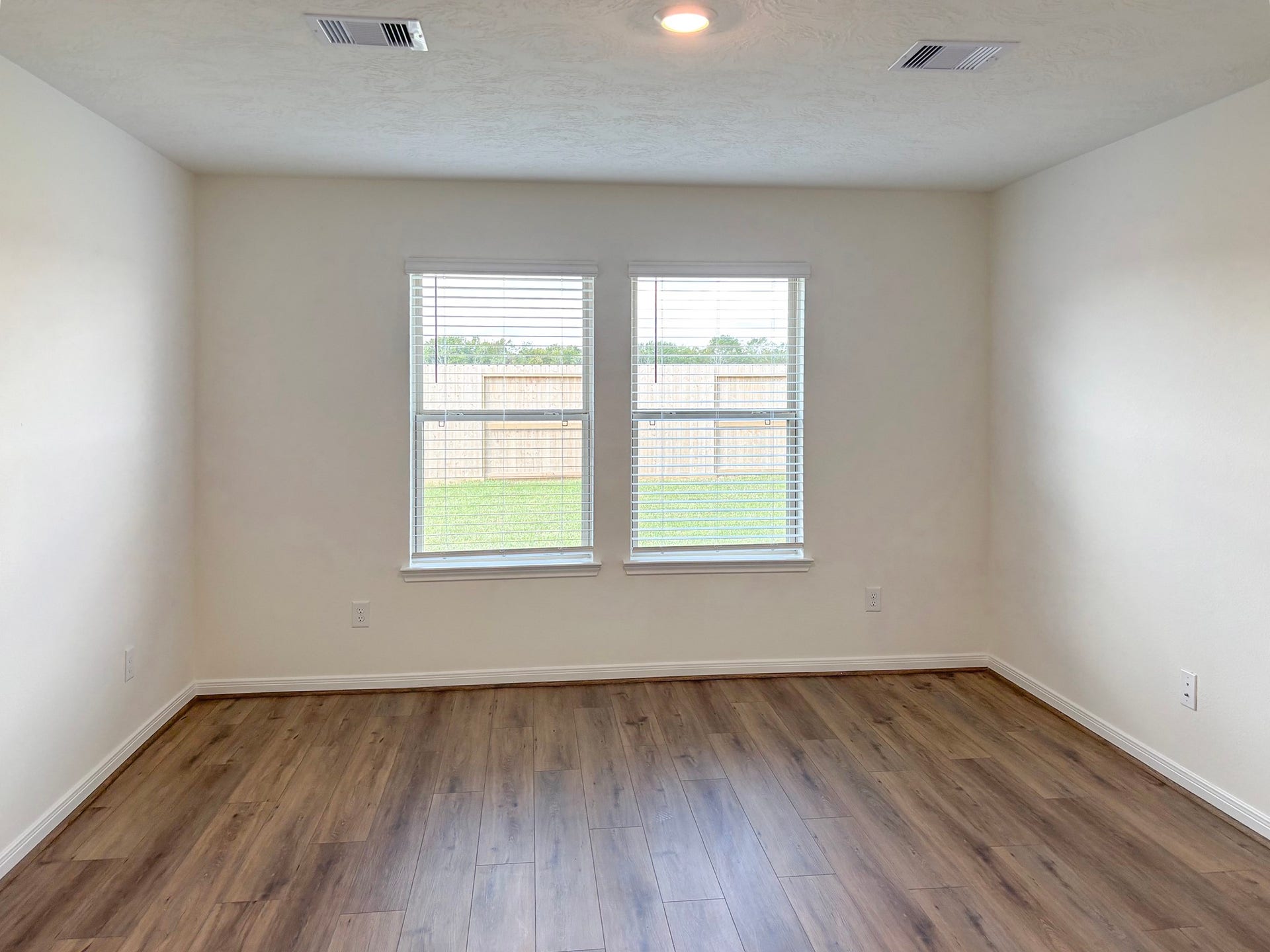 6018 Monte Thomas, Manvel, TX 77578 The primary bedroom is located at the rear of the home and away from the other bedrooms for extra privacy.