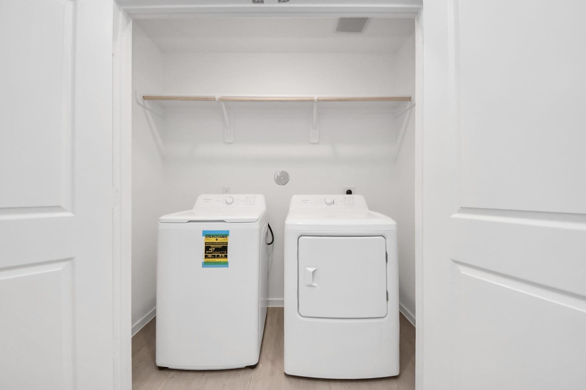 3096 Sunset Glory Drive, Katy, TX 77493 This home features a sleek, bright laundry space complete with a washer and dryer, ensuring convenience and modern living from day one.