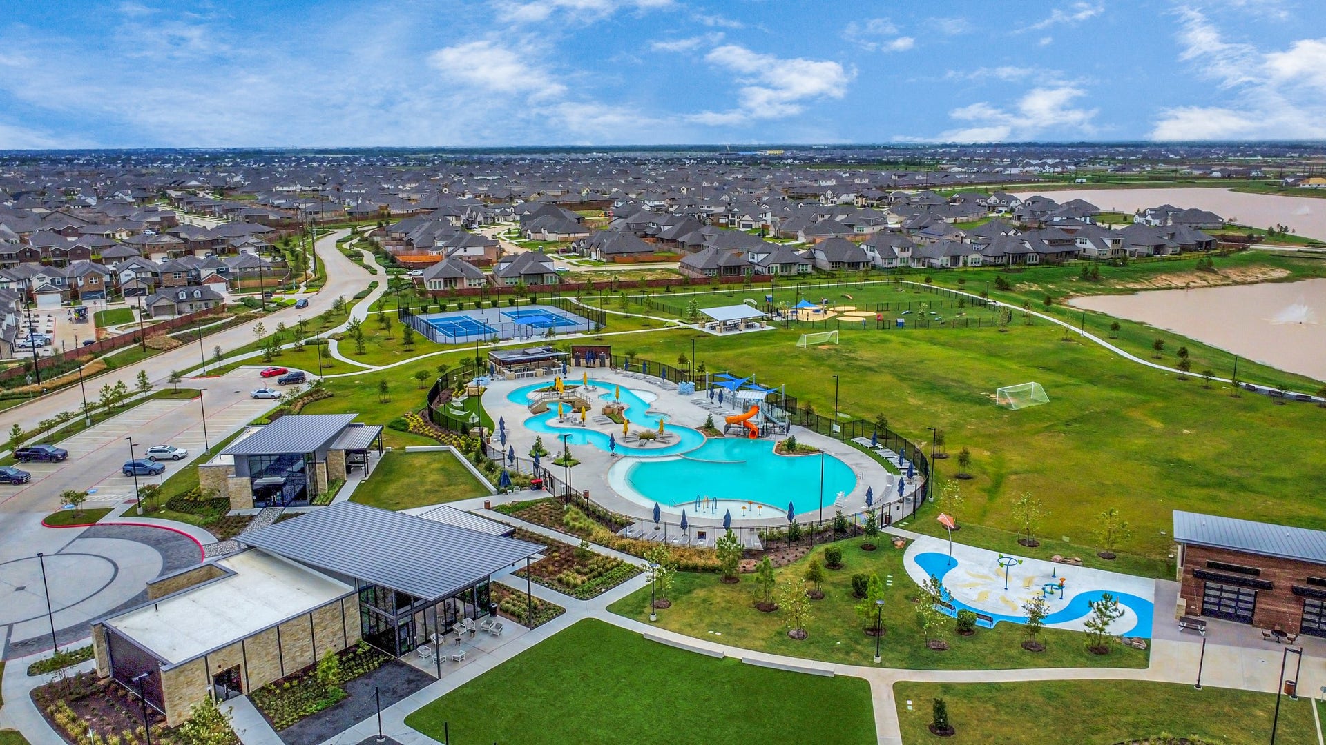 3096 Sunset Glory Drive, Katy, TX 77493 Discover "The Retreat Amenity Center," a vibrant oasis featuring a resort-style pool, sports courts, and lush green spaces, perfect for relaxation and community living in a picturesque neighborhood setting.