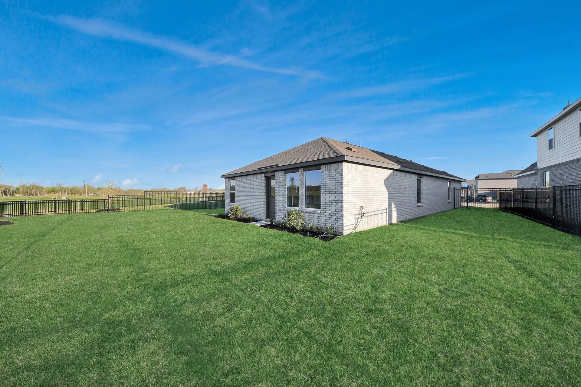 3096 Sunset Glory Drive, Katy, TX 77493 Discover tranquility in this home with a massive backyard offering stunning lake views.