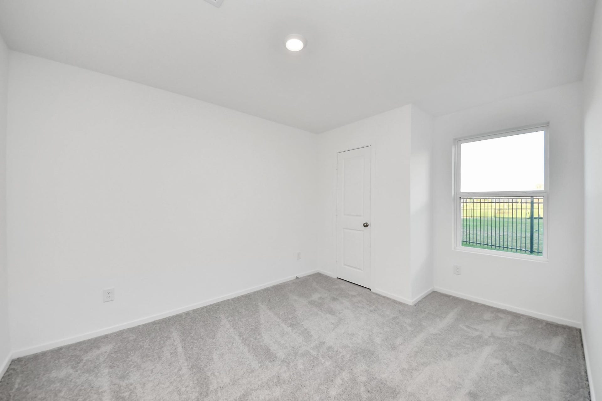 3096 Sunset Glory Drive, Katy, TX 77493 Experience tranquility in Bedroom Room 2, where natural light floods the space, beautifully highlighting its fresh, modern design.