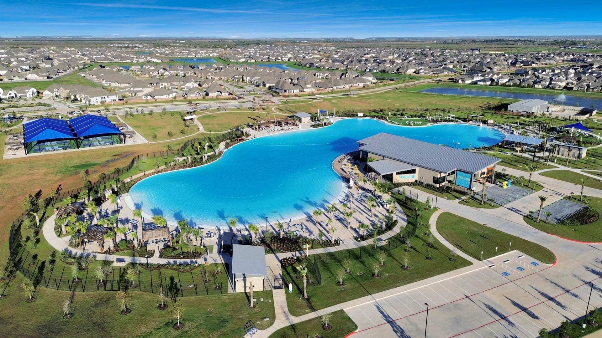 3096 Sunset Glory Drive, Katy, TX 77493 Discover the perfect blend of luxury and relaxation at Sol Club, featuring a stunning beach and expansive lagoon, offering an idyllic getaway right at your doorstep.