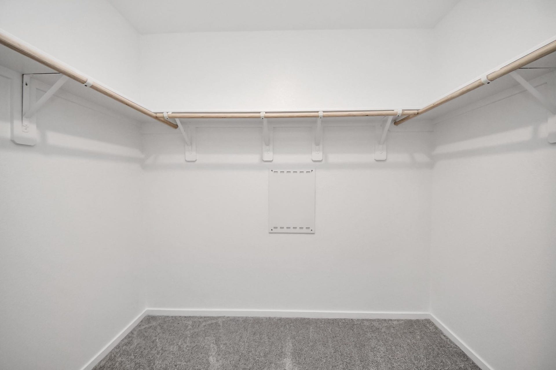 3096 Sunset Glory Drive, Katy, TX 77493 Discover the spacious primary closet, offering ample storage and a sleek, organized design perfect for all your wardrobe needs.