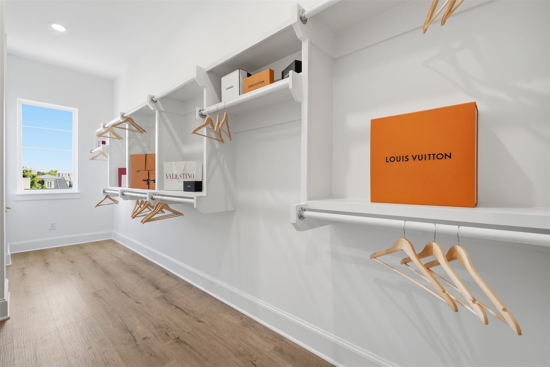 2111 Nantucket Drive, #C, Houston, TX 77057 An oversized walk-in closet provides extensive hanging and storage space, along with natural light for an added touch of luxury.