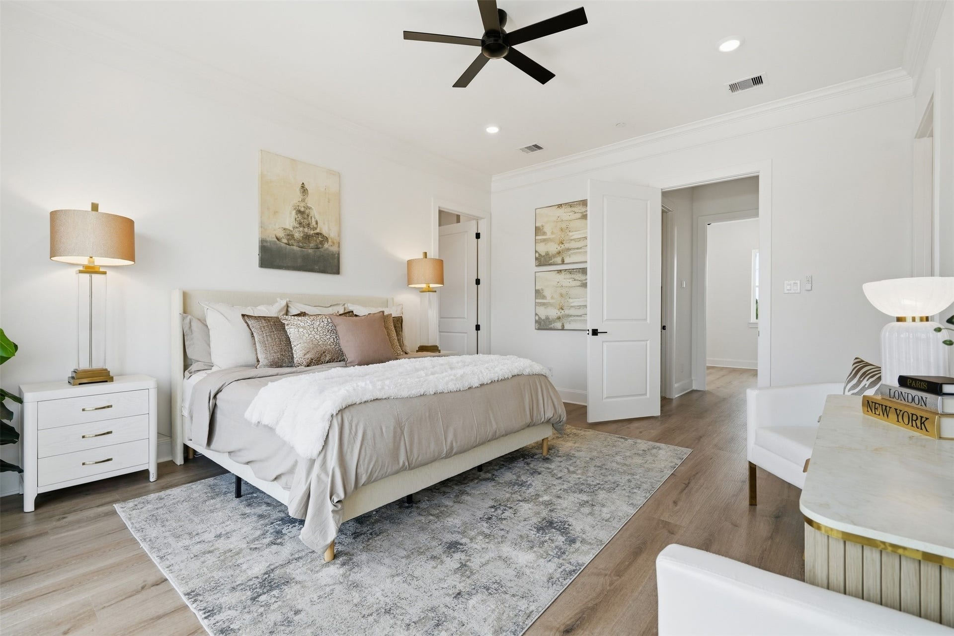 2111 Nantucket Drive, #C, Houston, TX 77057 Another view of the primary suite showcases its impressive scale and thoughtful layout, creating a comfortable place to unwind at the end of the day.