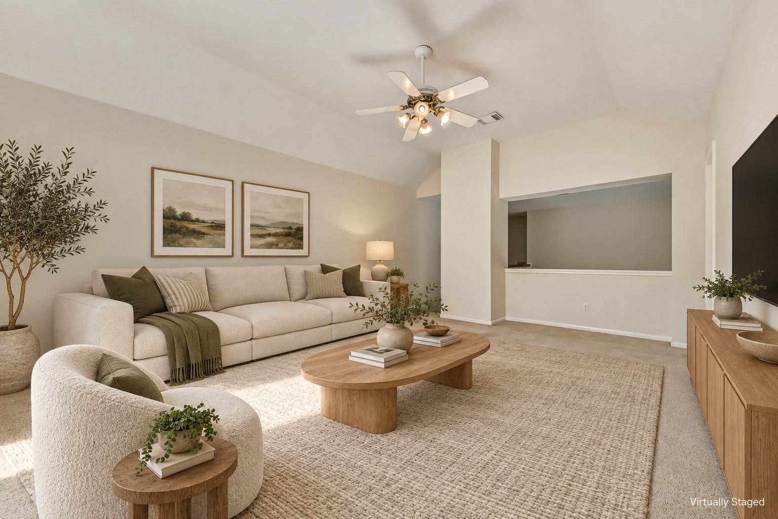 Virtually staged  Picture movie nights, game-day gatherings, or a quiet evening upstairs. A vaulted ceiling and arched window give this flexible living space an airy feel and distinctive character.