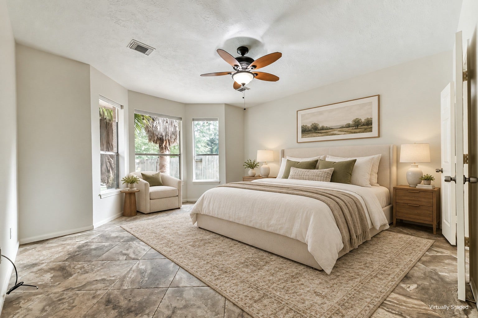 Virtually staged  Unwind in a bedroom filled with natural light and leafy backyard views. The window alcove offers a lovely setting for a reading chair, giving you a place to pause before starting or ending the day.