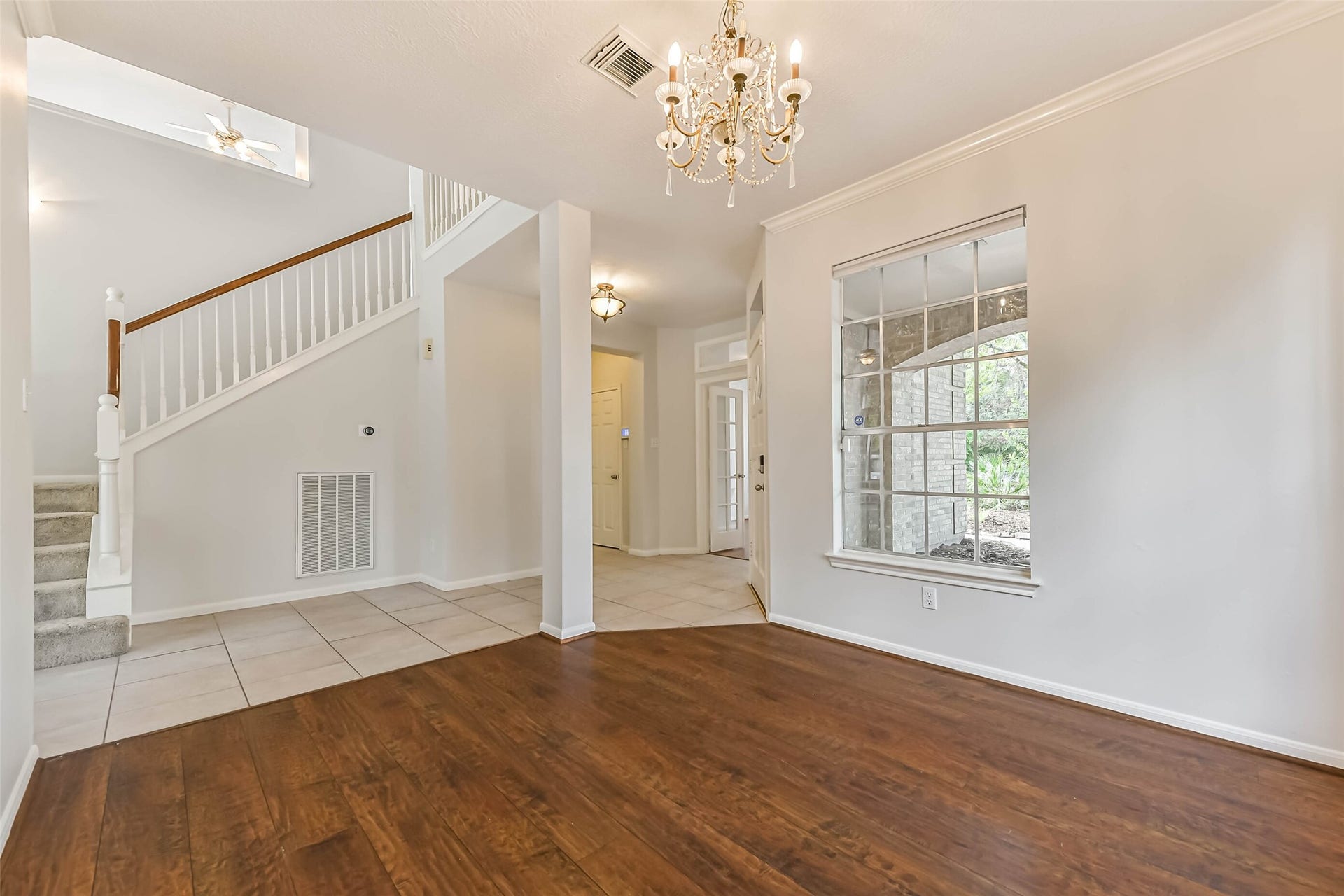 Welcome guests into a dining space that feels connected to the home while maintaining its own distinct setting. The open connection to the foyer makes entertaining feel natural, with room to bring your own dining style to life.