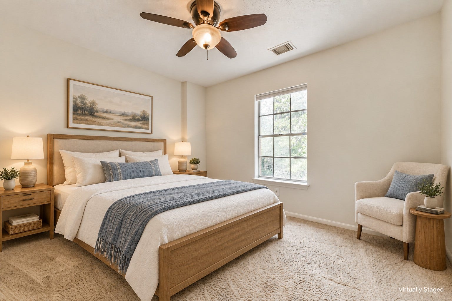 Virtually staged  A cozy bedroom with room to rest and a spot for a desk offers flexibility for daily routines. Soft natural light and an angled ceiling lend the space a welcoming sense of character.