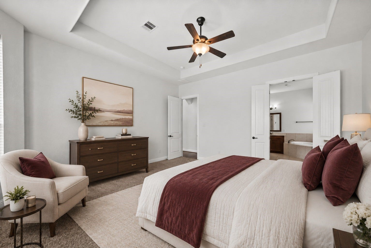 26111 Tintagel Lane, Kingwood, TX 77339 Virtually Stagged - Serene primary suite offers direct access to a spa-like ensuite bath with a soaking tub, the ideal blend of comfort and privacy!