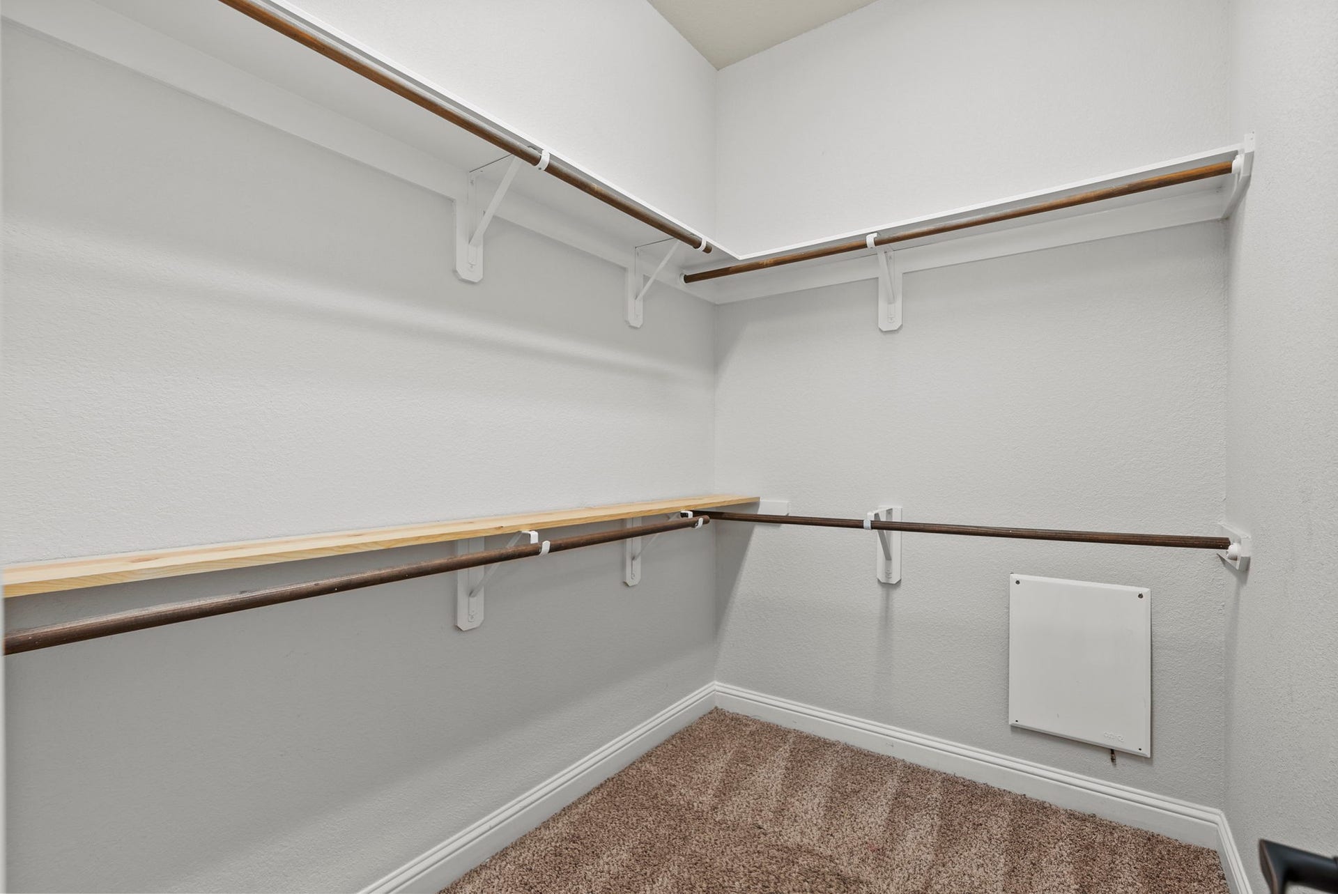 26111 Tintagel Lane, Kingwood, TX 77339 Spacious walk-in closet offers ample double-hung rod storage, plenty of room to organize your entire wardrobe with ease!