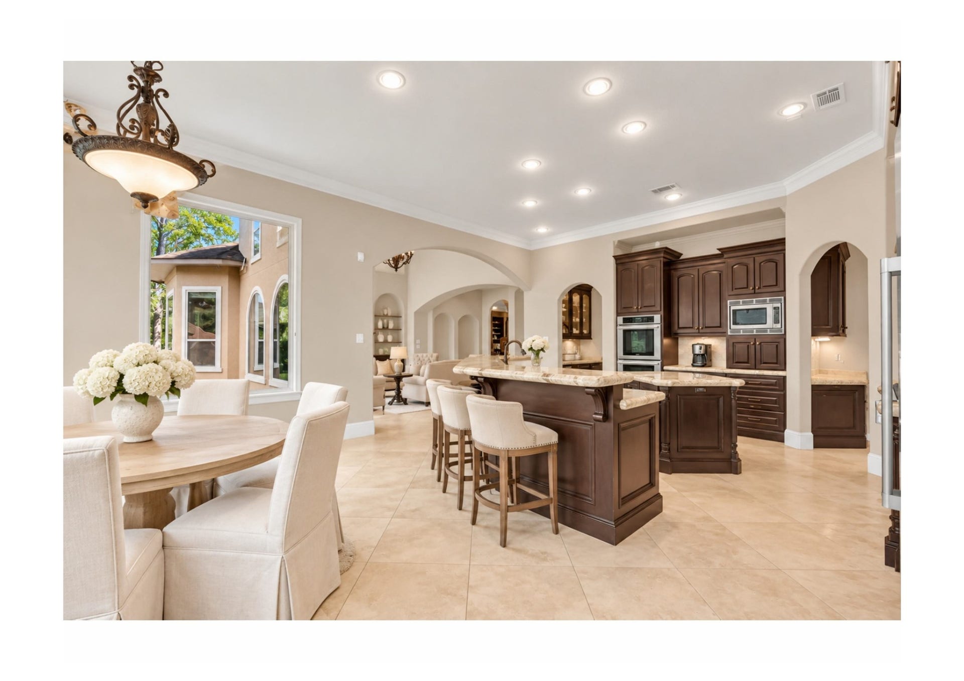 Spacious kitchen and breakfast area designed for effortless entertaining.