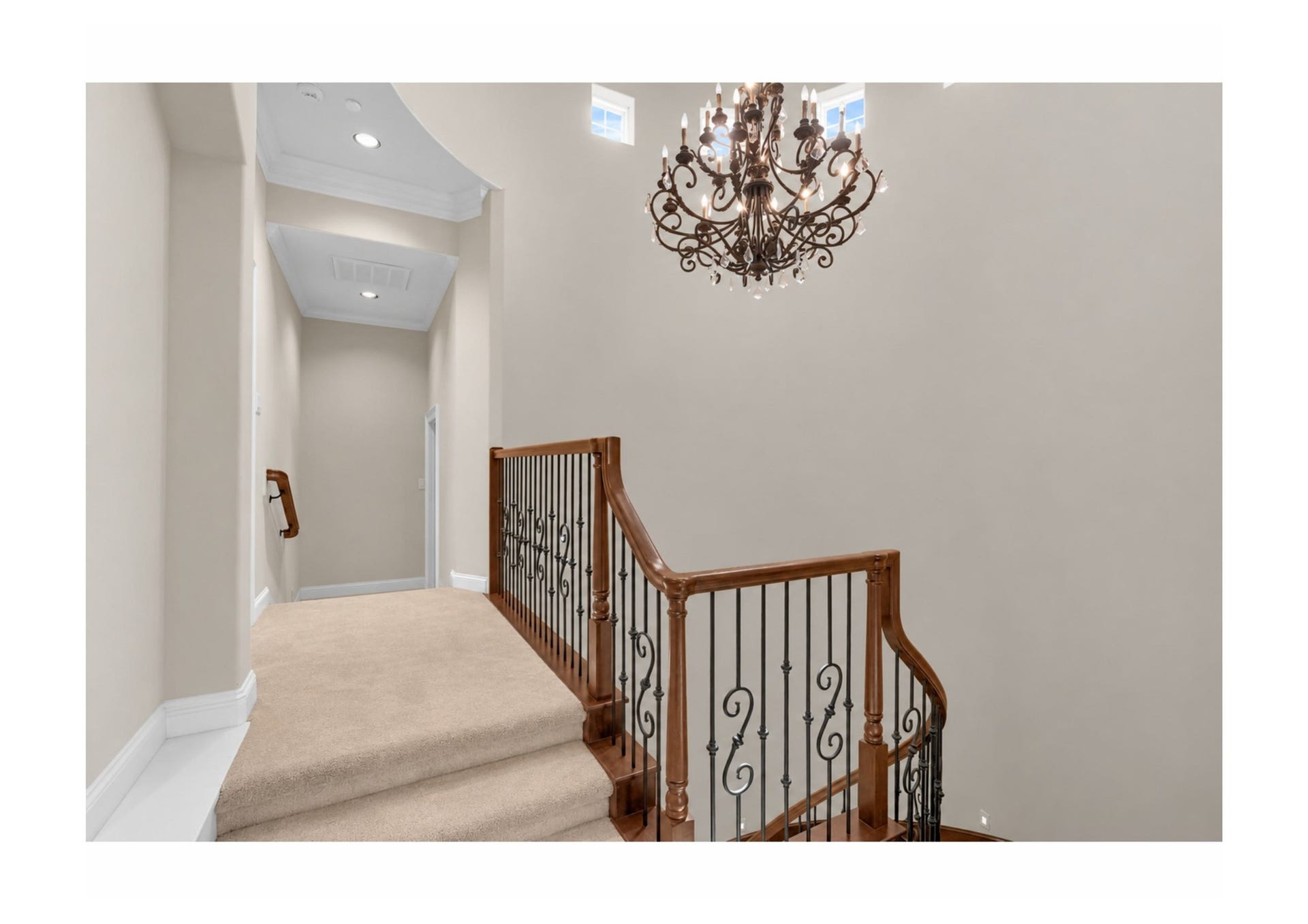 Stair Landing on the 2nd floor. Media room entrance is located in the at the end of this short hallway.