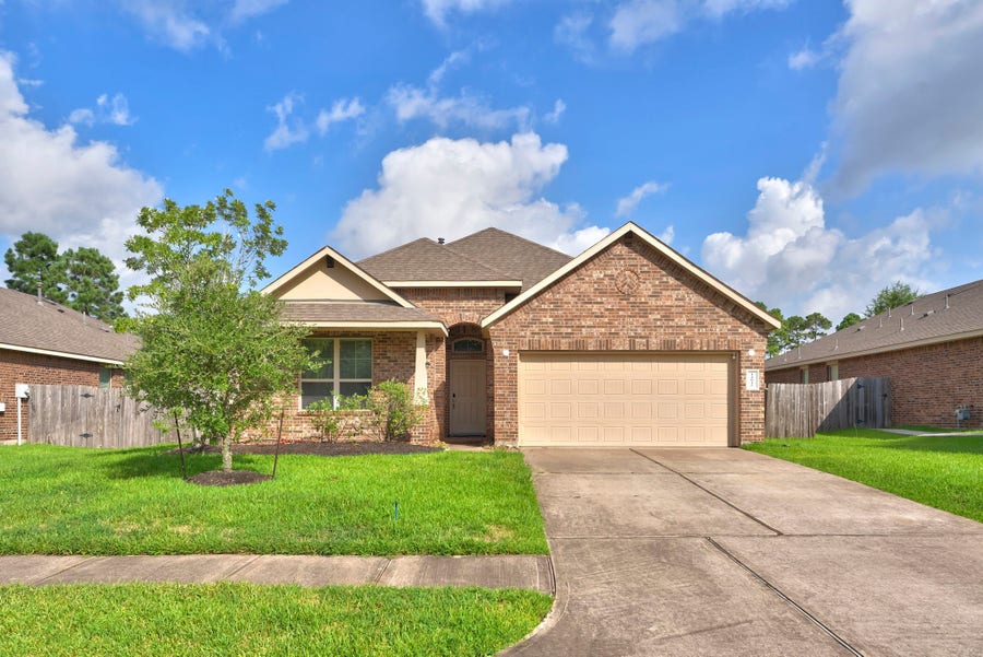 Property photo for 14015 Routt Forest Trail, Conroe, TX