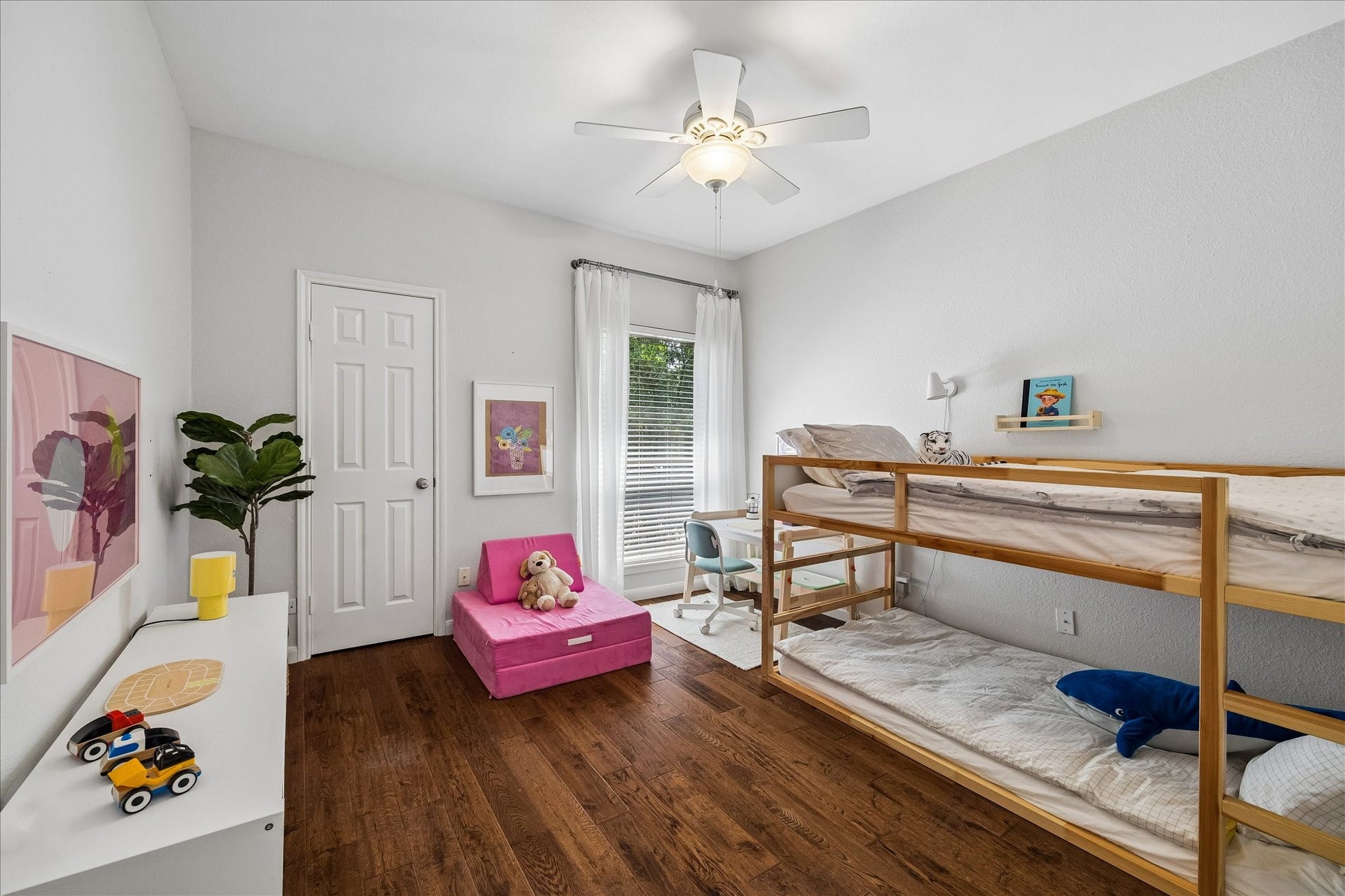 Bright secondary bedroom ideal for guests, a home office, or flex space.