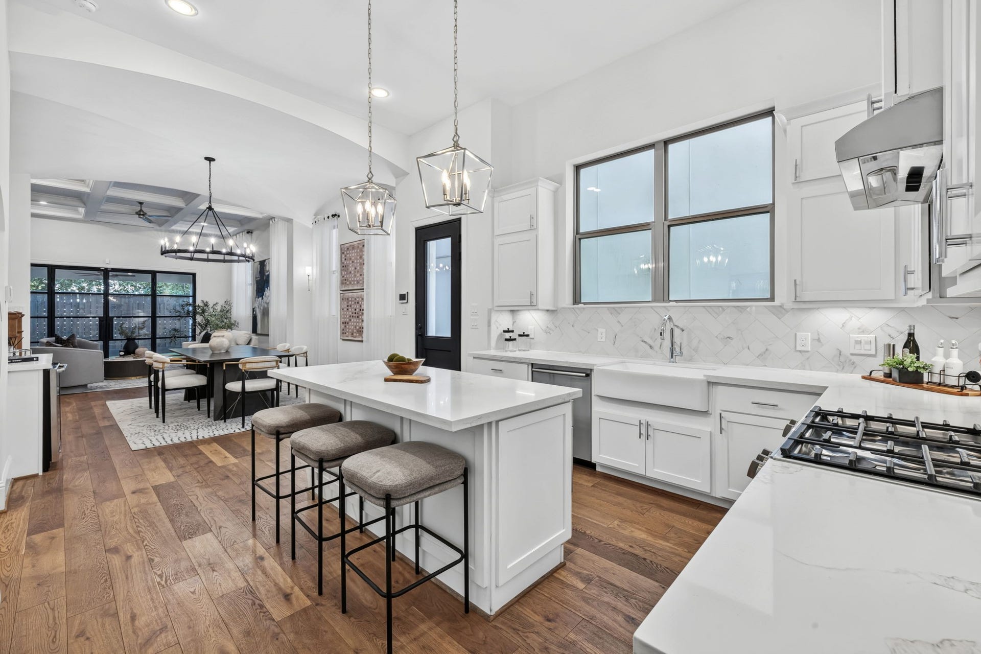 1713 Holman Street, Houston, TX 77004 Open concept main floor features a seamless flow between the kitchen, dining, and family roomideal for everyday living and easy entertaining.