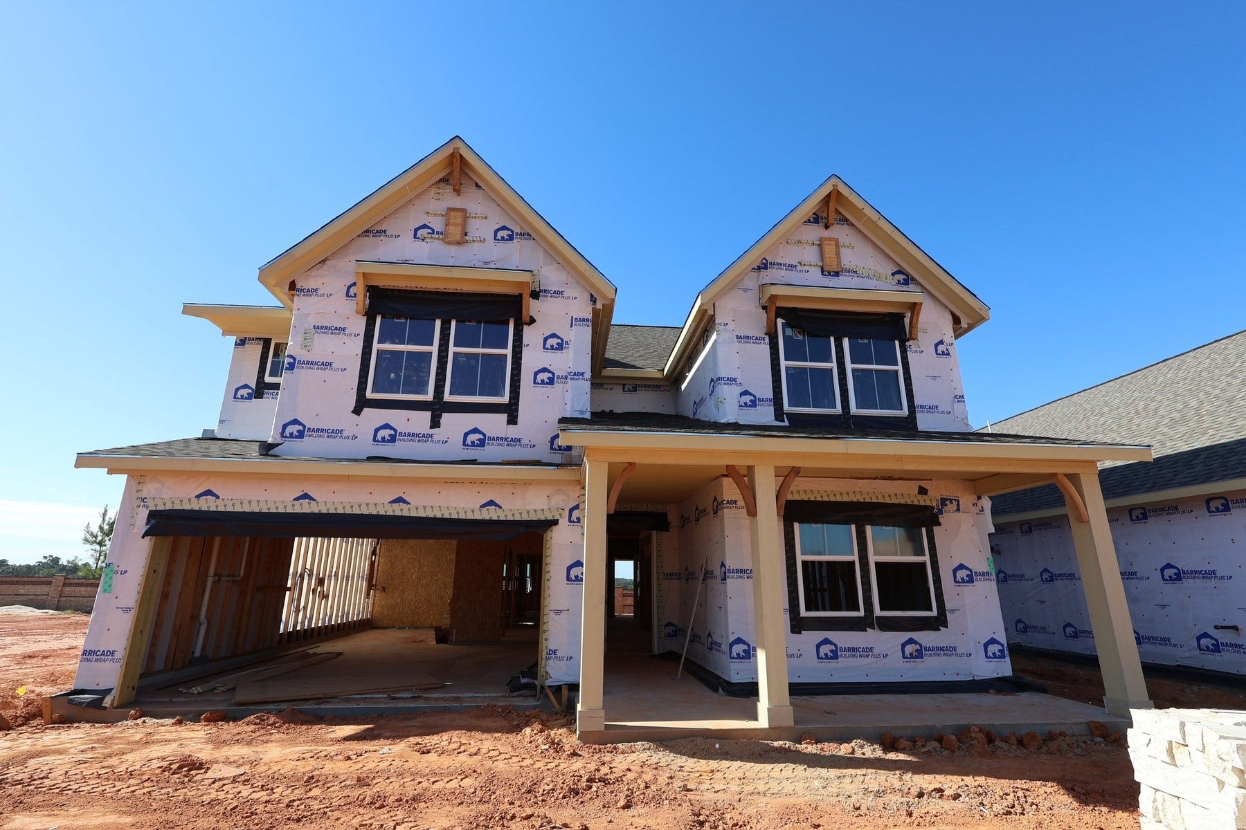 Two story home with 5 beds, 4.5 baths, and 3 car tandem garage