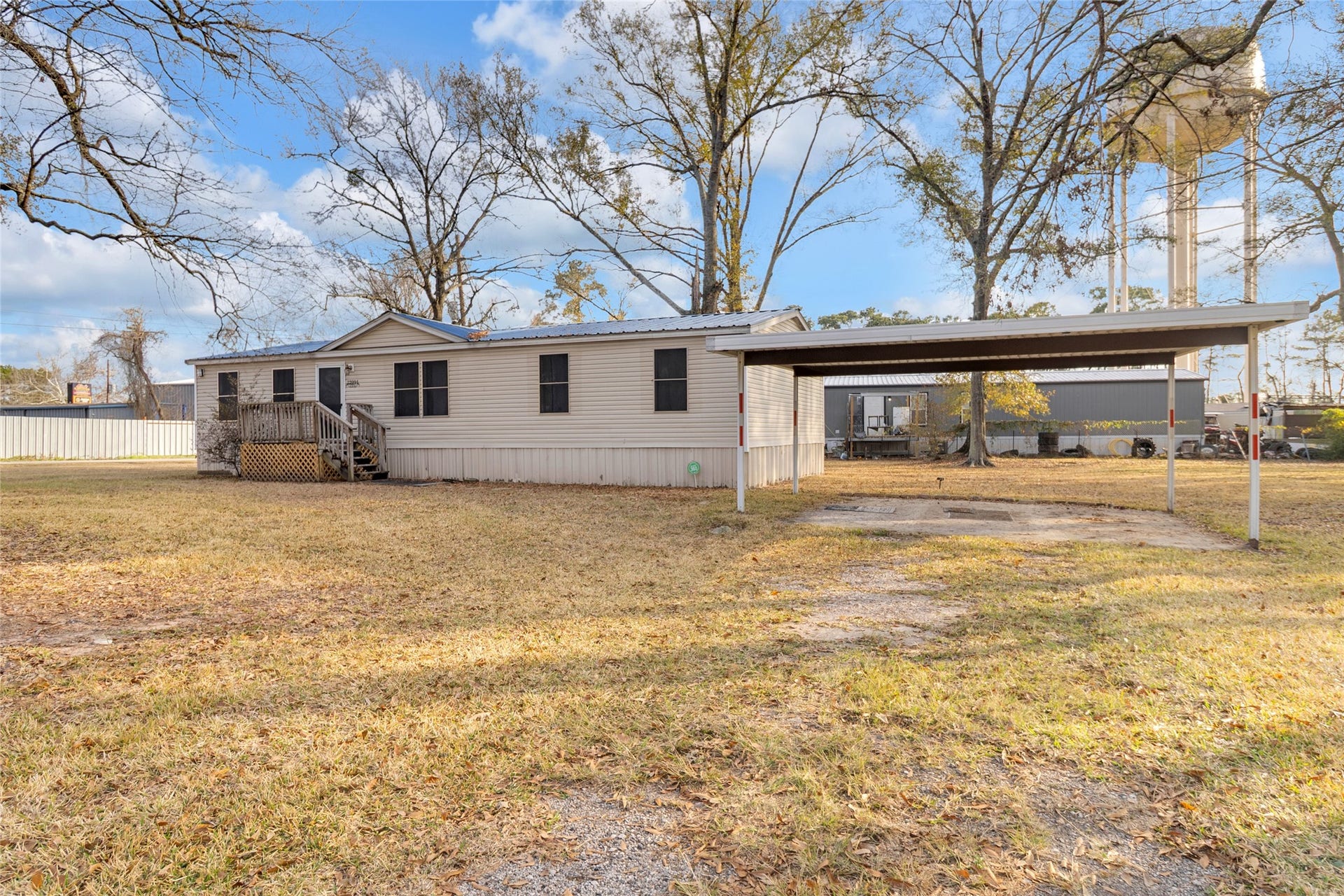 The setting is peaceful and offers ample outdoor space.
