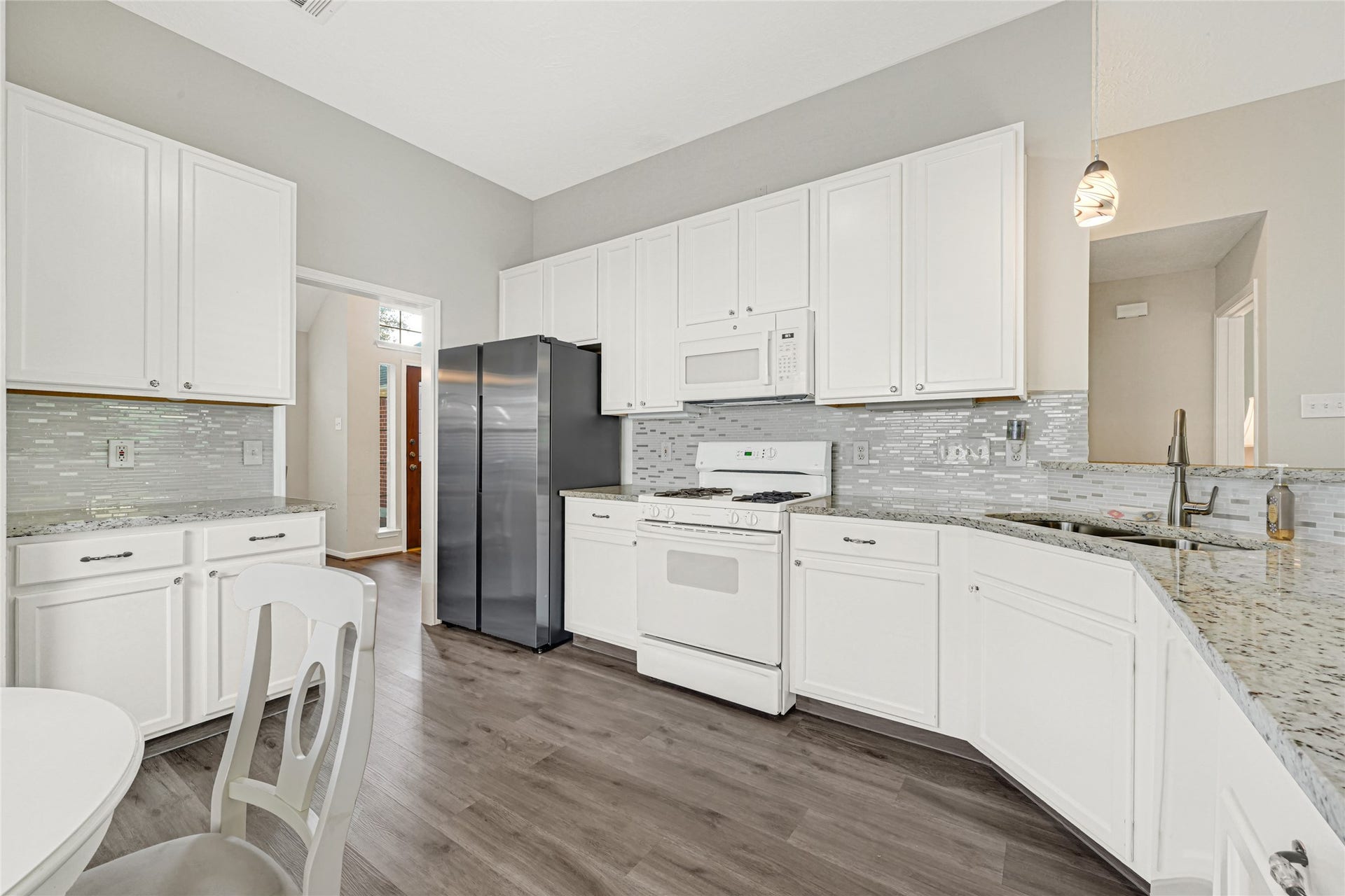 804 Cherry Blossom Drive, League City, TX 77573 kitchen is open to the living room with access as well to the dining room
