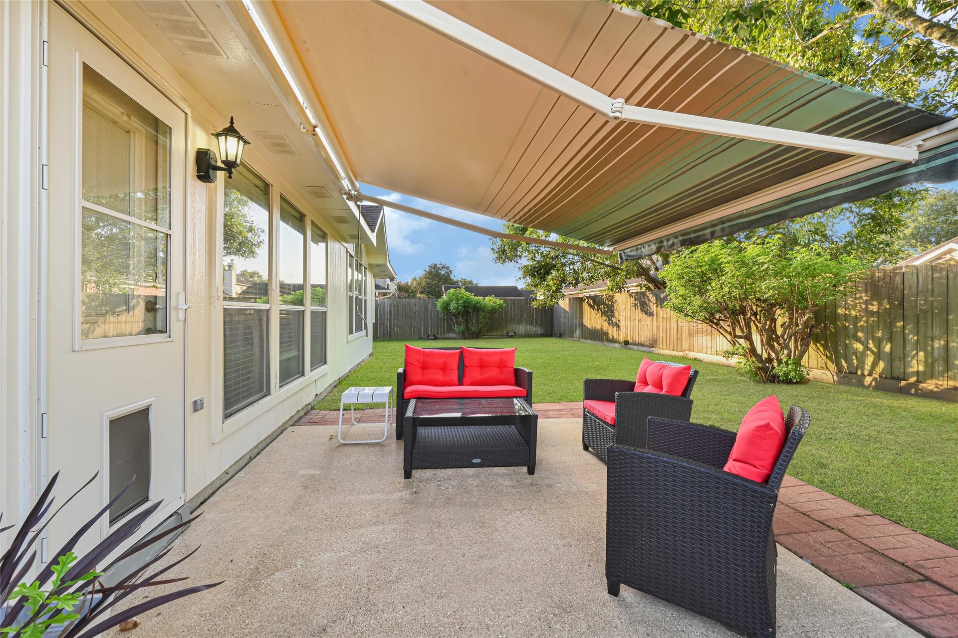 804 Cherry Blossom Drive, League City, TX 77573 enjoy the covered back patio