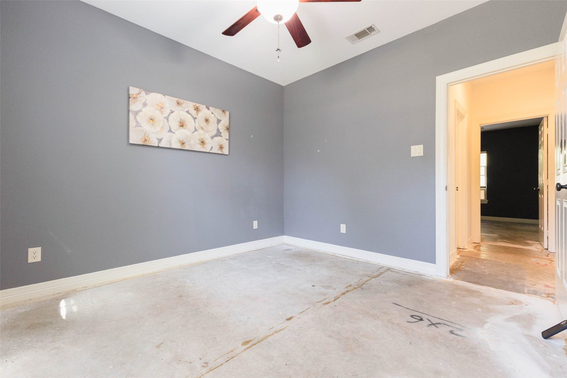 346 Skylark Street, Magnolia, TX 77355 Bedroom 2 features a ceiling fan and a generously sized layout, offering flexibility for a guest bedroom, home office, or additional living space.