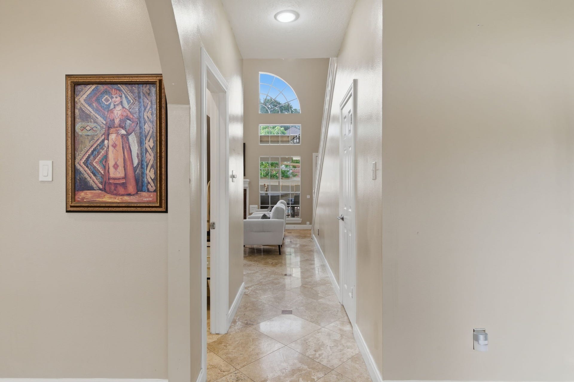 14114 Scarborough Fair Street, Houston, TX 77077 Stunning natural light leading from the entrance of the home into the spacious living room