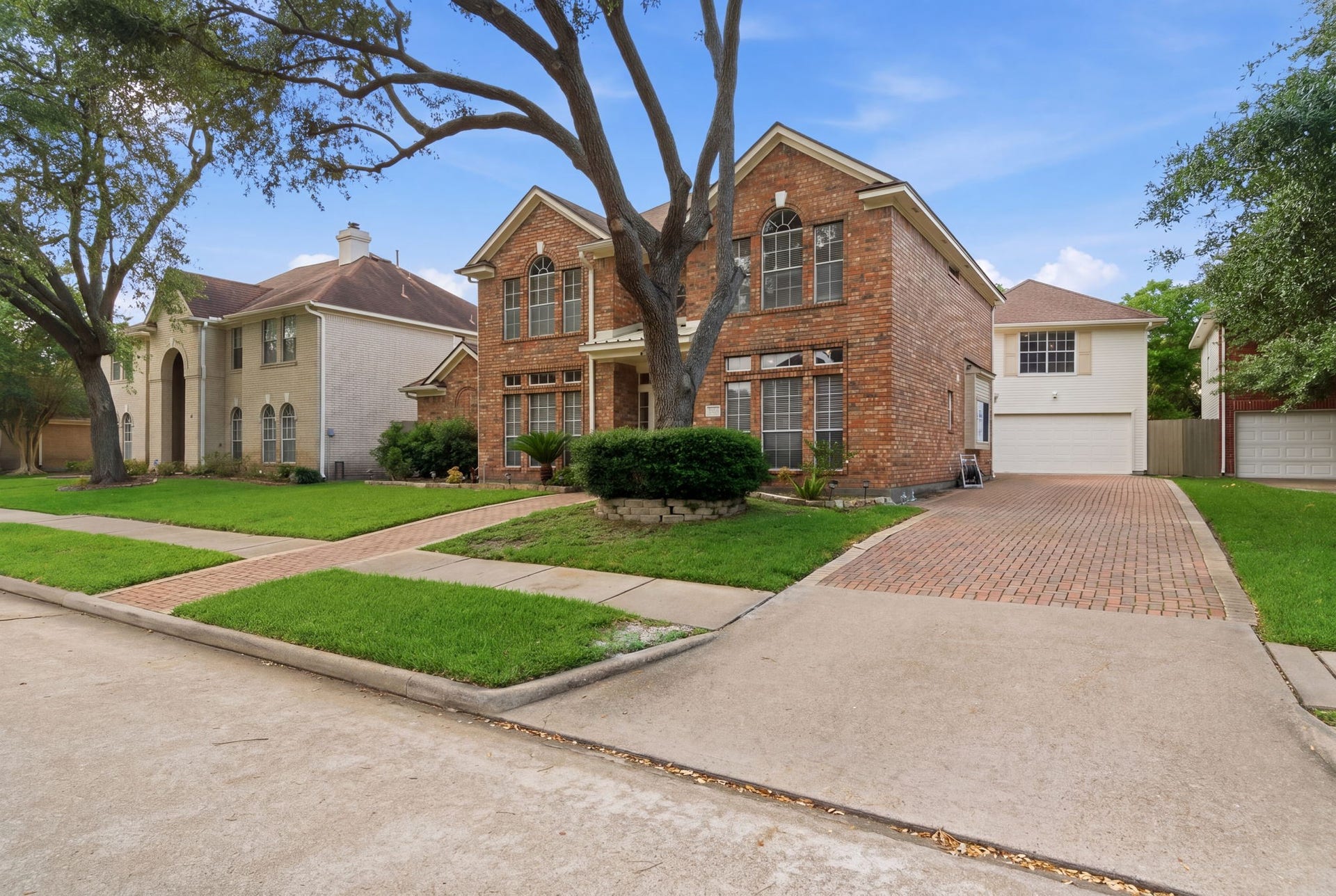 14114 Scarborough Fair Street, Houston, TX 77077 Owners extended driveway to create more space for added cars- perfect for hosting