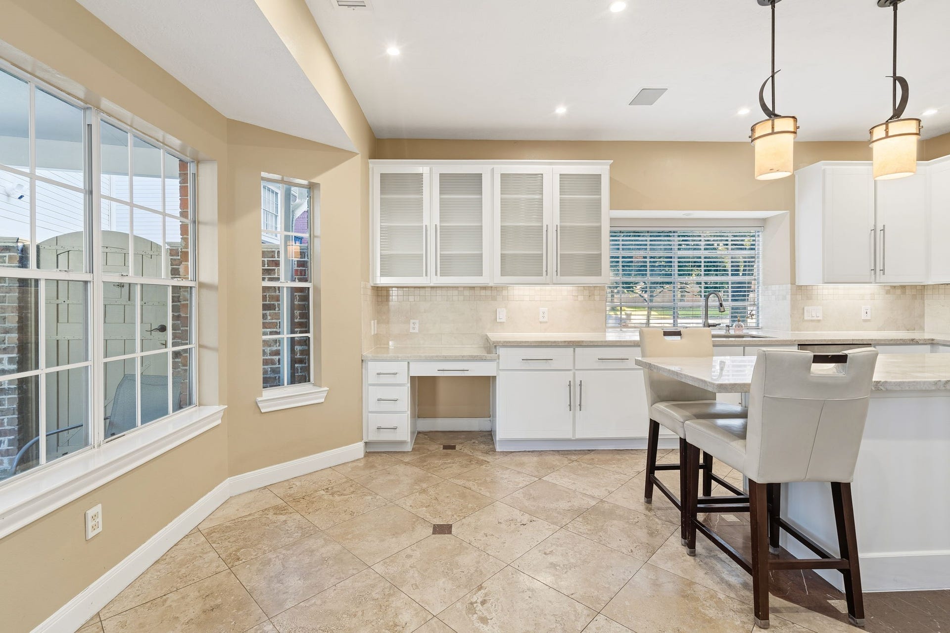 14114 Scarborough Fair Street, Houston, TX 77077 Kitchen nook overlooks the pool with tons of windows for natural lighting