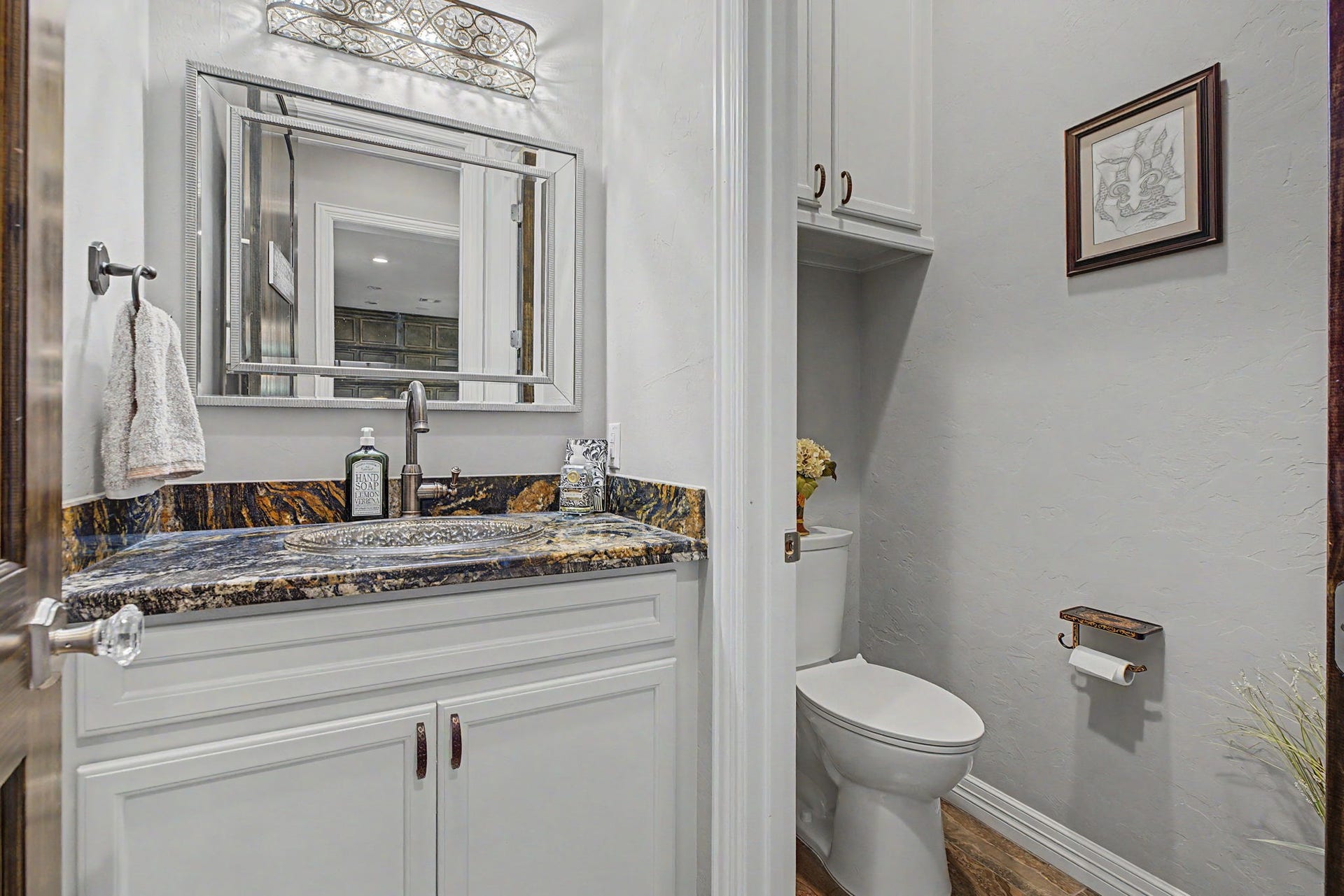 11865 Hope Lane, Magnolia, TX 77354 Convenient and stylish half bath located just steps from the main living areas.