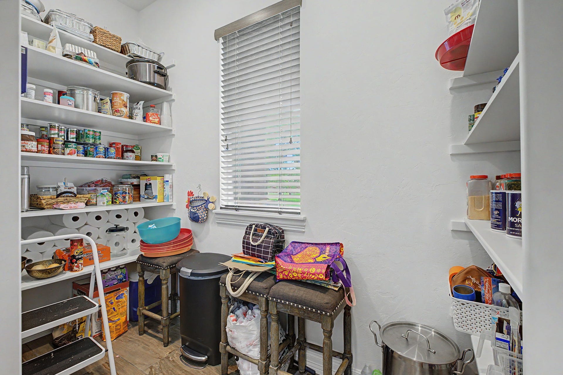 11865 Hope Lane, Magnolia, TX 77354 You'll love this massive walk-in pantry, featuring plenty of room for groceries, small appliances, and all your kitchen essentials.
