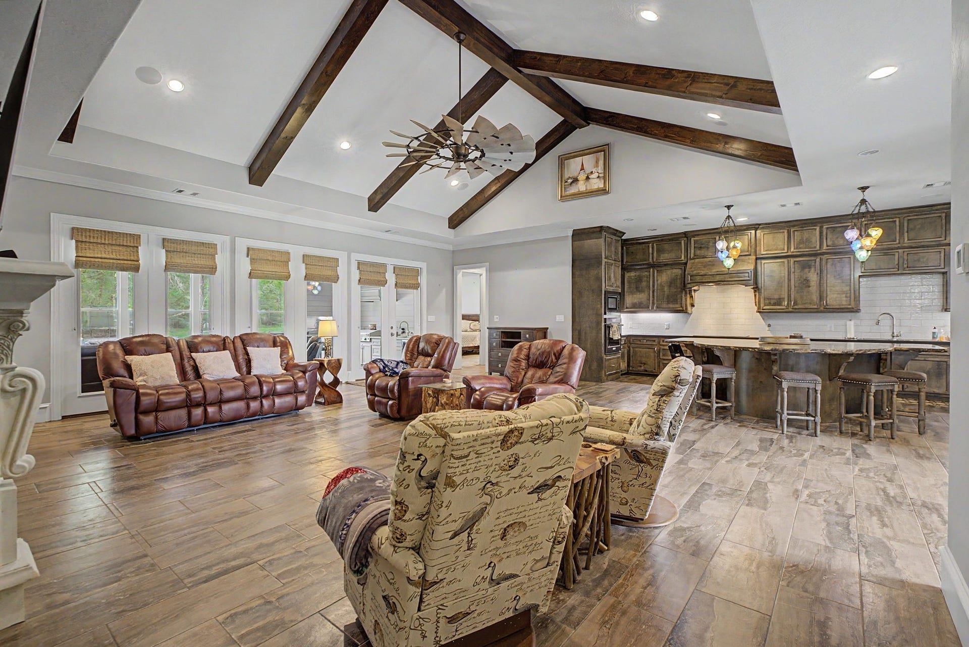 11865 Hope Lane, Magnolia, TX 77354 Spacious open-concept living area seamlessly connecting the kitchen and living area perfect for entertaining and everyday living.