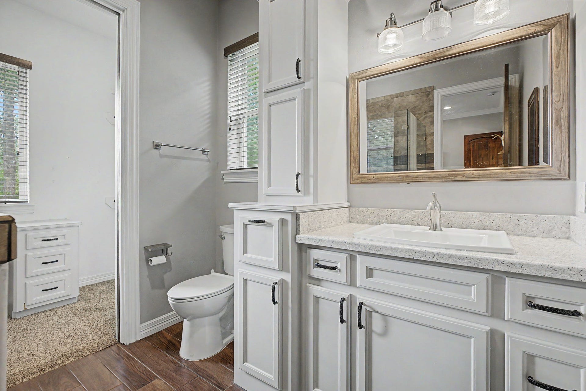 11865 Hope Lane, Magnolia, TX 77354 The ensuite bathroom for Secondary Bedroom #1 is light, bright, and offers an abundance of cabinet storage.