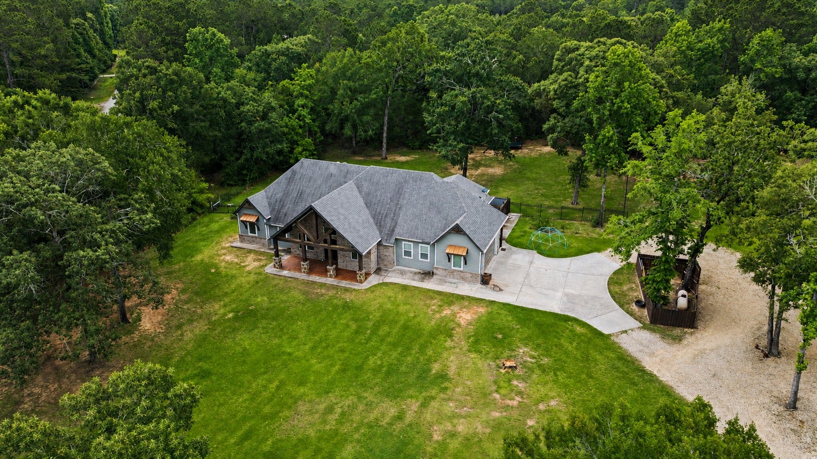11865 Hope Lane, Magnolia, TX 77354 Nestled on 5 beautiful acres in the sought-after Lake Creek Ranchettes subdivision.