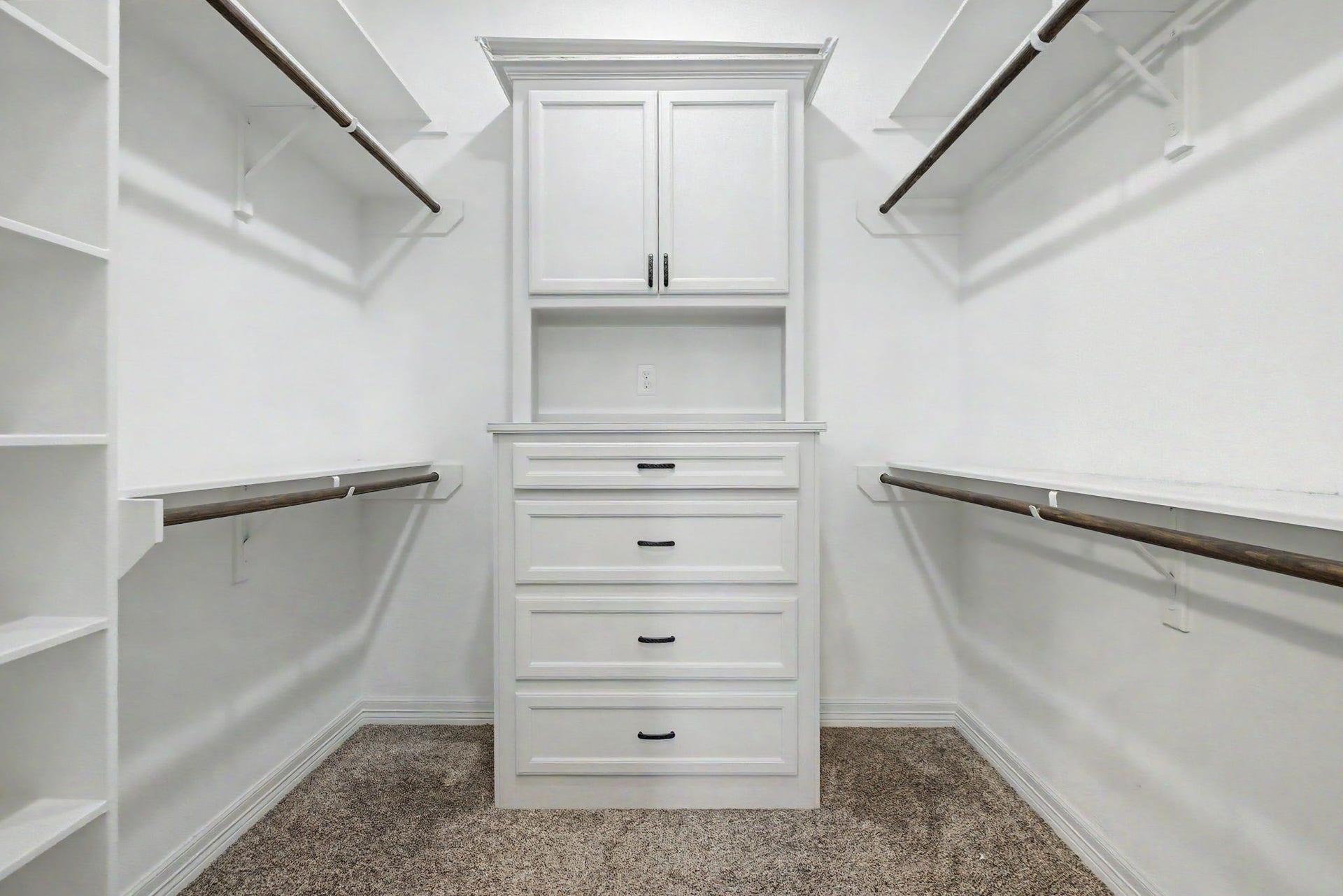 11865 Hope Lane, Magnolia, TX 77354 Primary Walk-In Closet #2 features custom built-ins and abundant storage space, helping keep everything neatly organized.