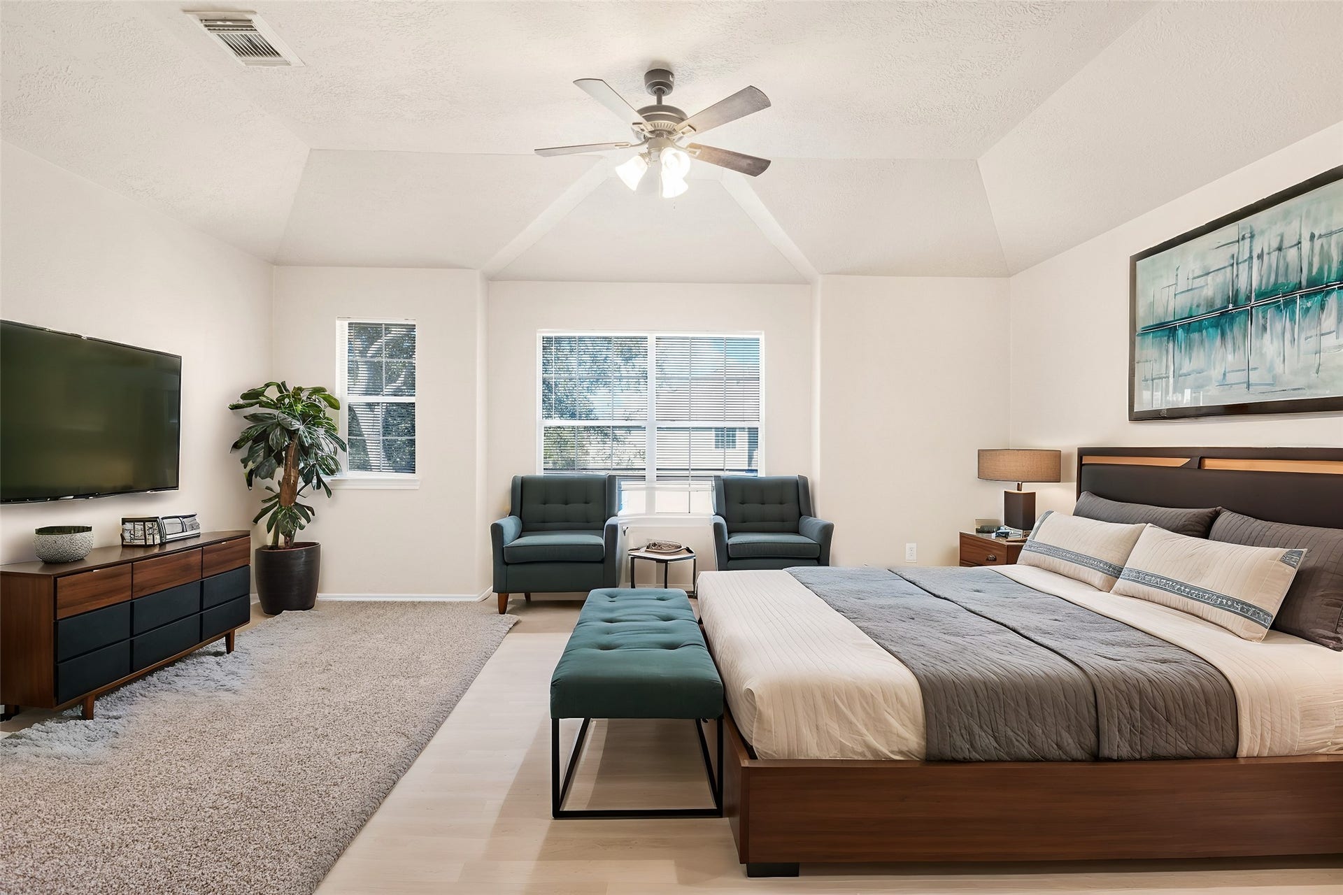3412 Orchid Trace Lane, Houston, TX 77047 Spacious, bright primary features brand-new carpeted flooring, and a ceiling fan. It features two windows offering natural light and vaulted ceilings for an open feel *virtually staged*