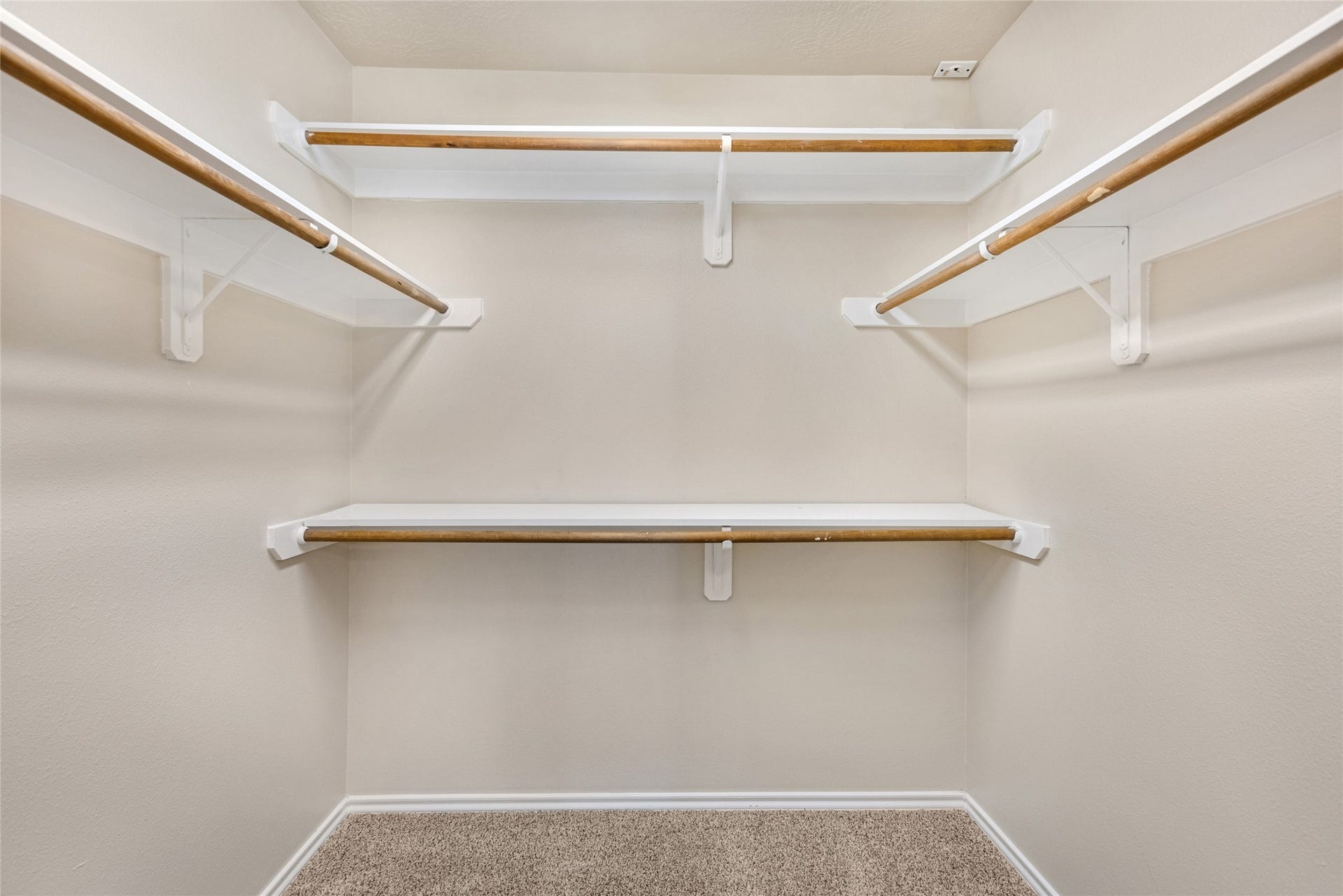 3412 Orchid Trace Lane, Houston, TX 77047 Oversized walk-in closet with built-in shelves and hanging rods. Ideal for additional storage or avid shopper ;)