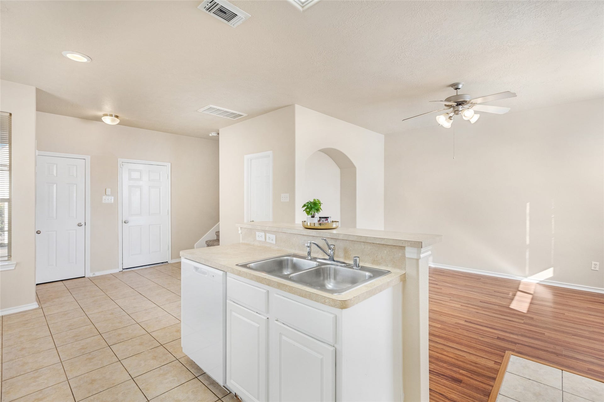 3412 Orchid Trace Lane, Houston, TX 77047 Enjoy an open-concept layout with a modern breakfast bar , tiled flooring, and abundant natural light