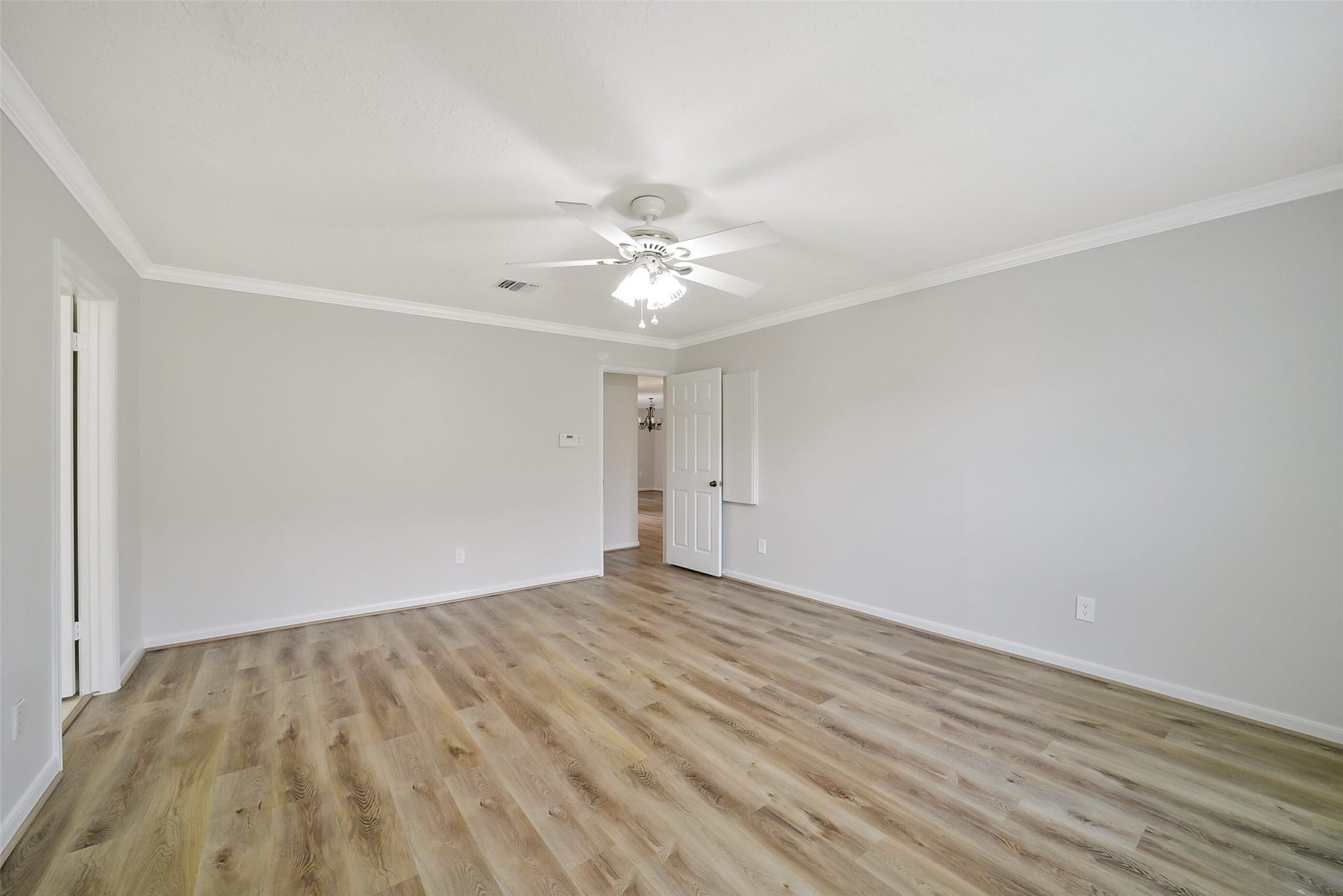 Another view of the primary bedroom.