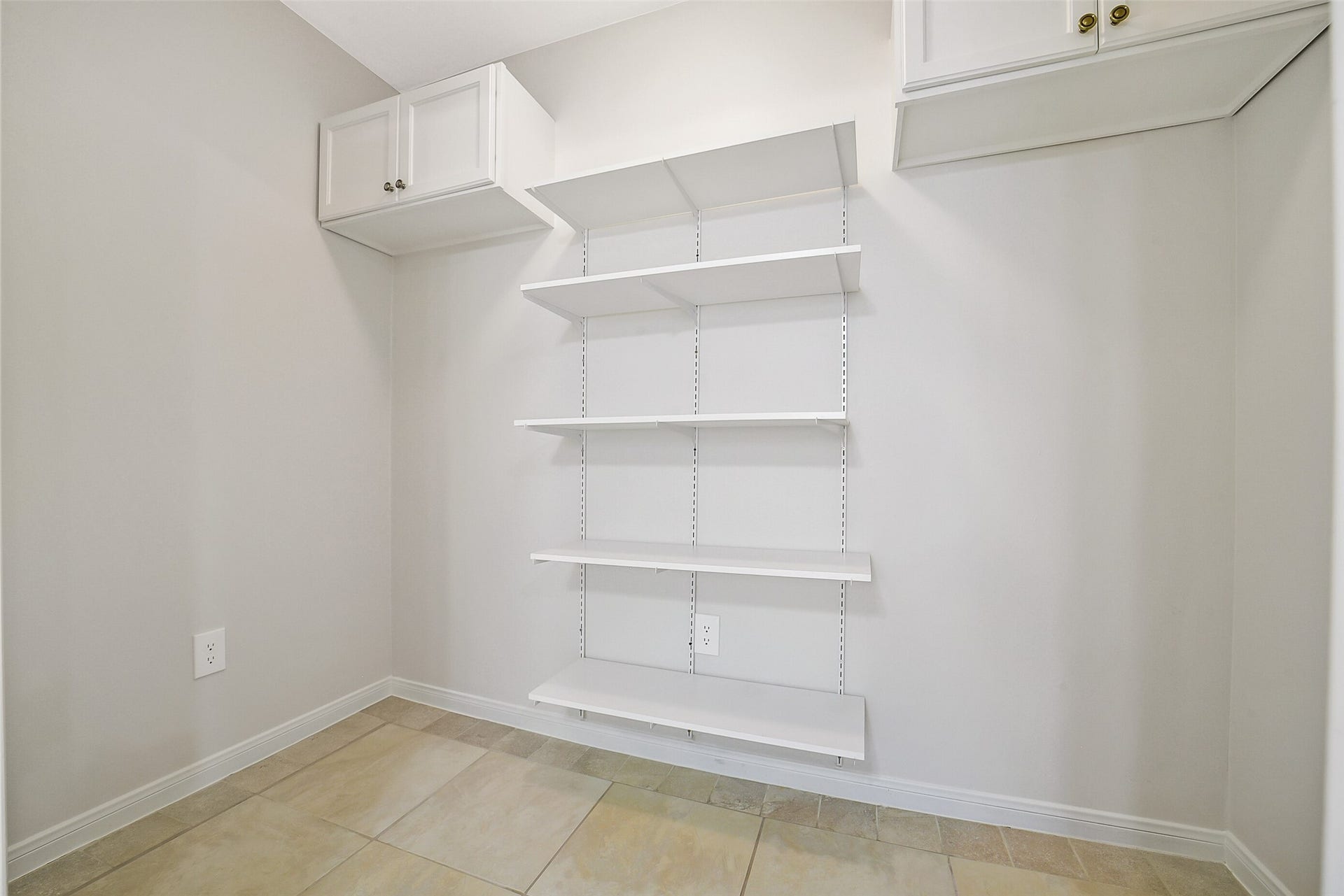 The walk-in pantry for the kitchen.