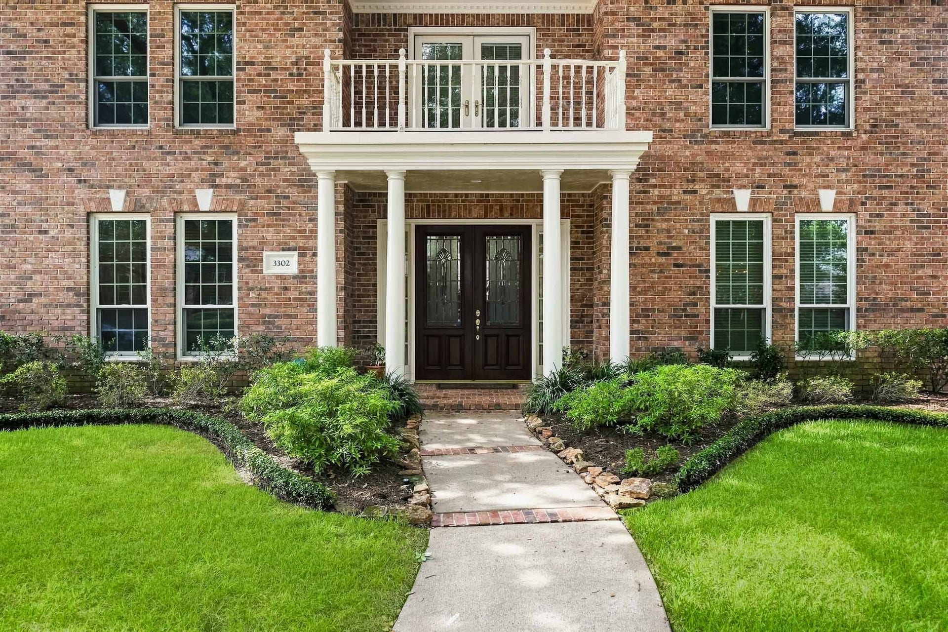 Wonderful curb appeal with double leaded glass doors, energy efficient Andersen Windows and New Orleans Style brick.